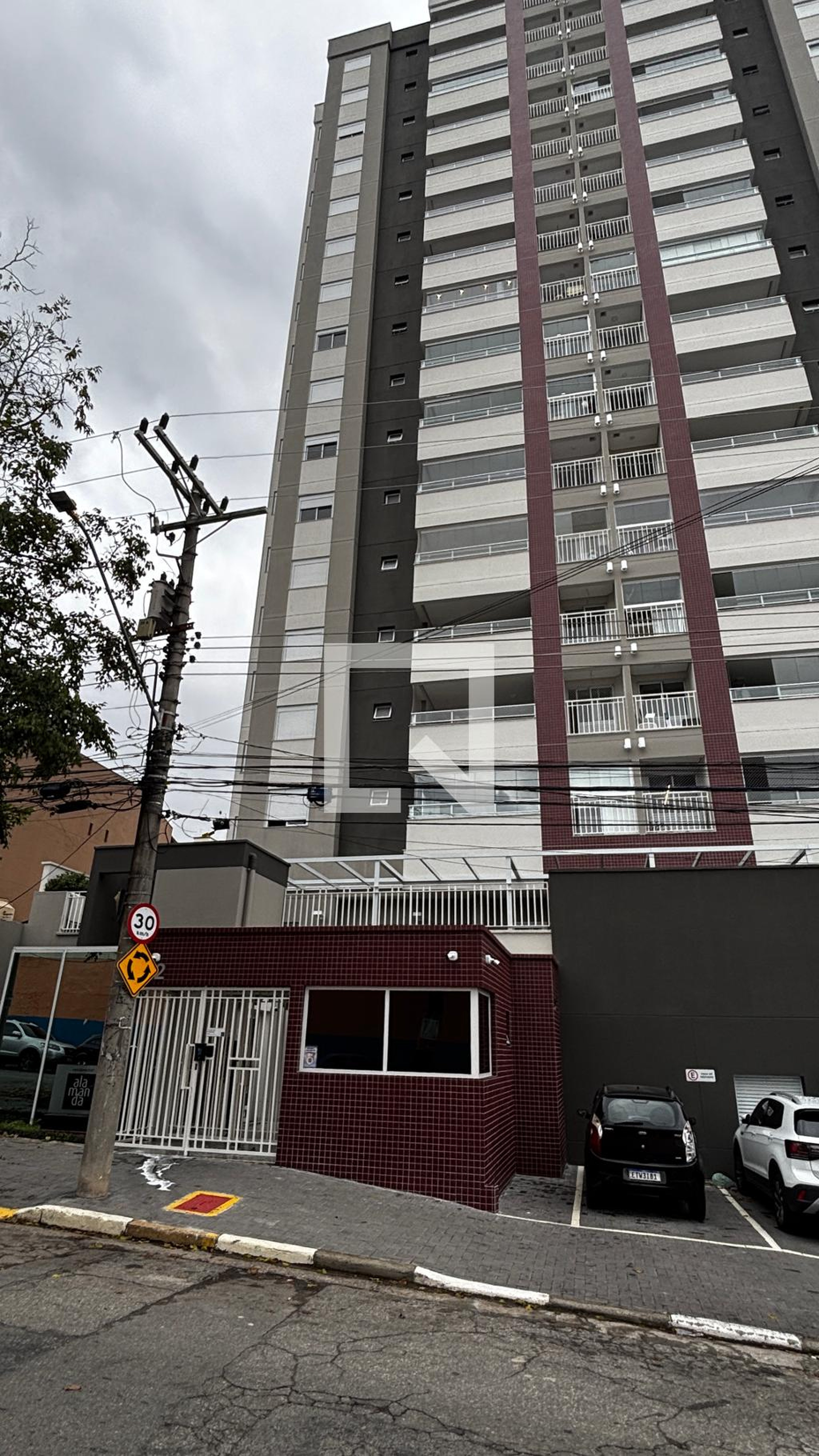 Fachada Condomínio em Rua Coroados, 112