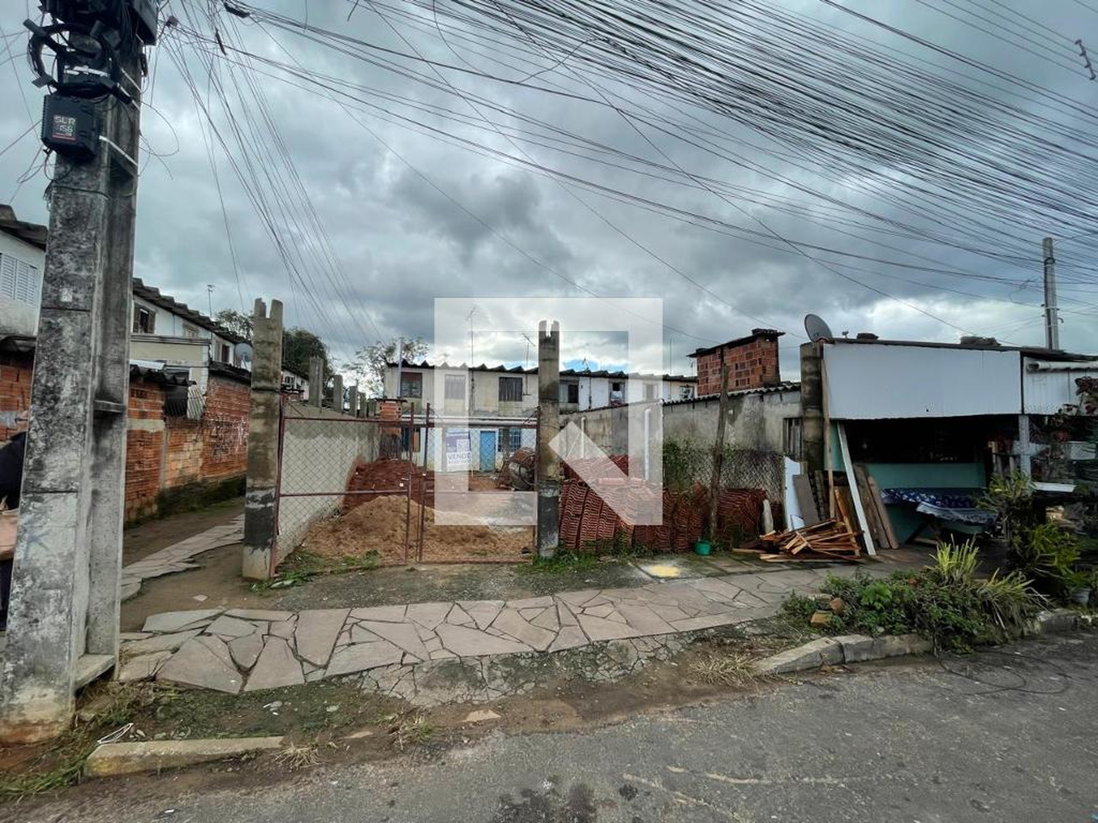 Fachada Condomínio em Rua Pontes de Miranda, 53