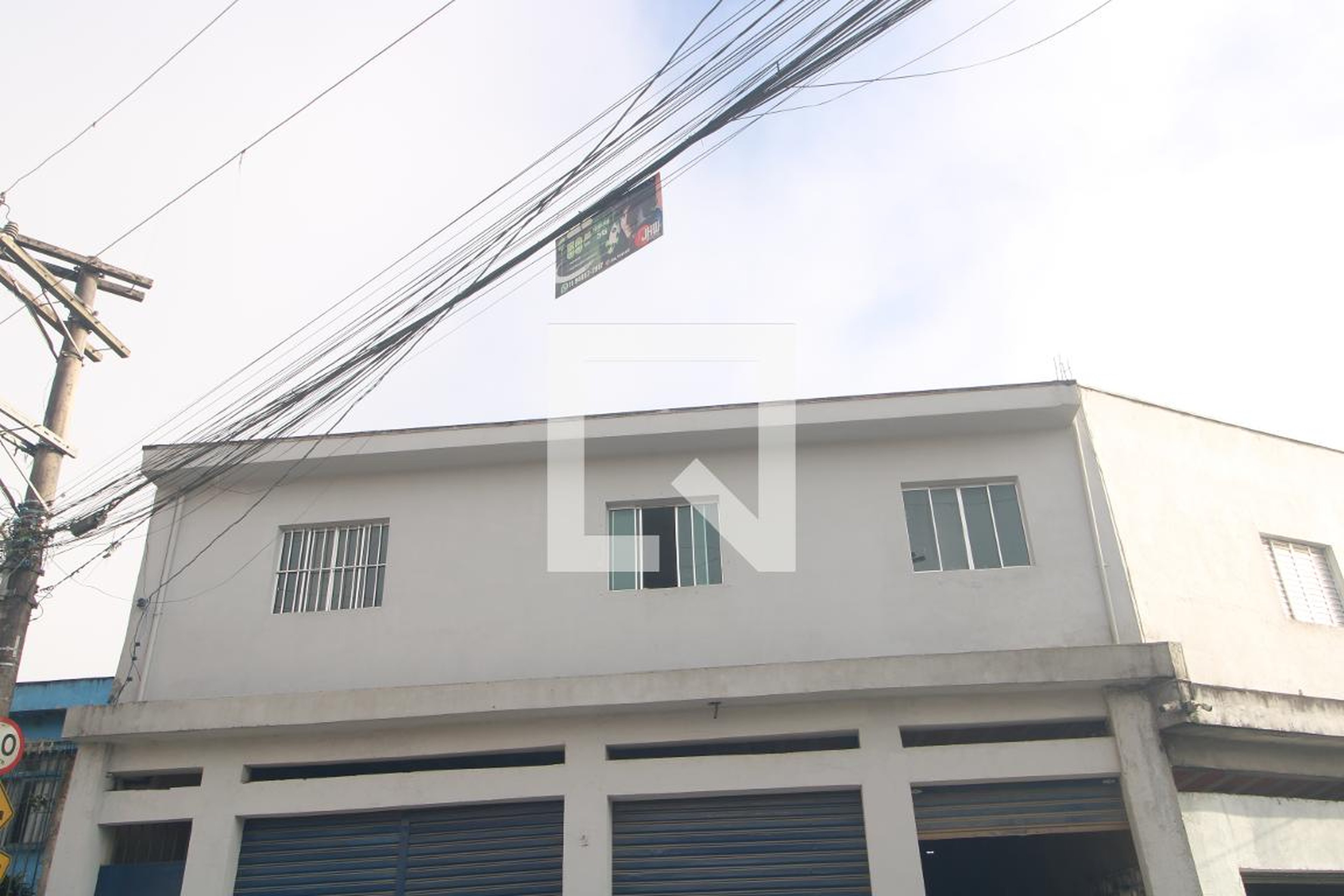 Fachada Condomínio em Rua Esther Lang, 2
