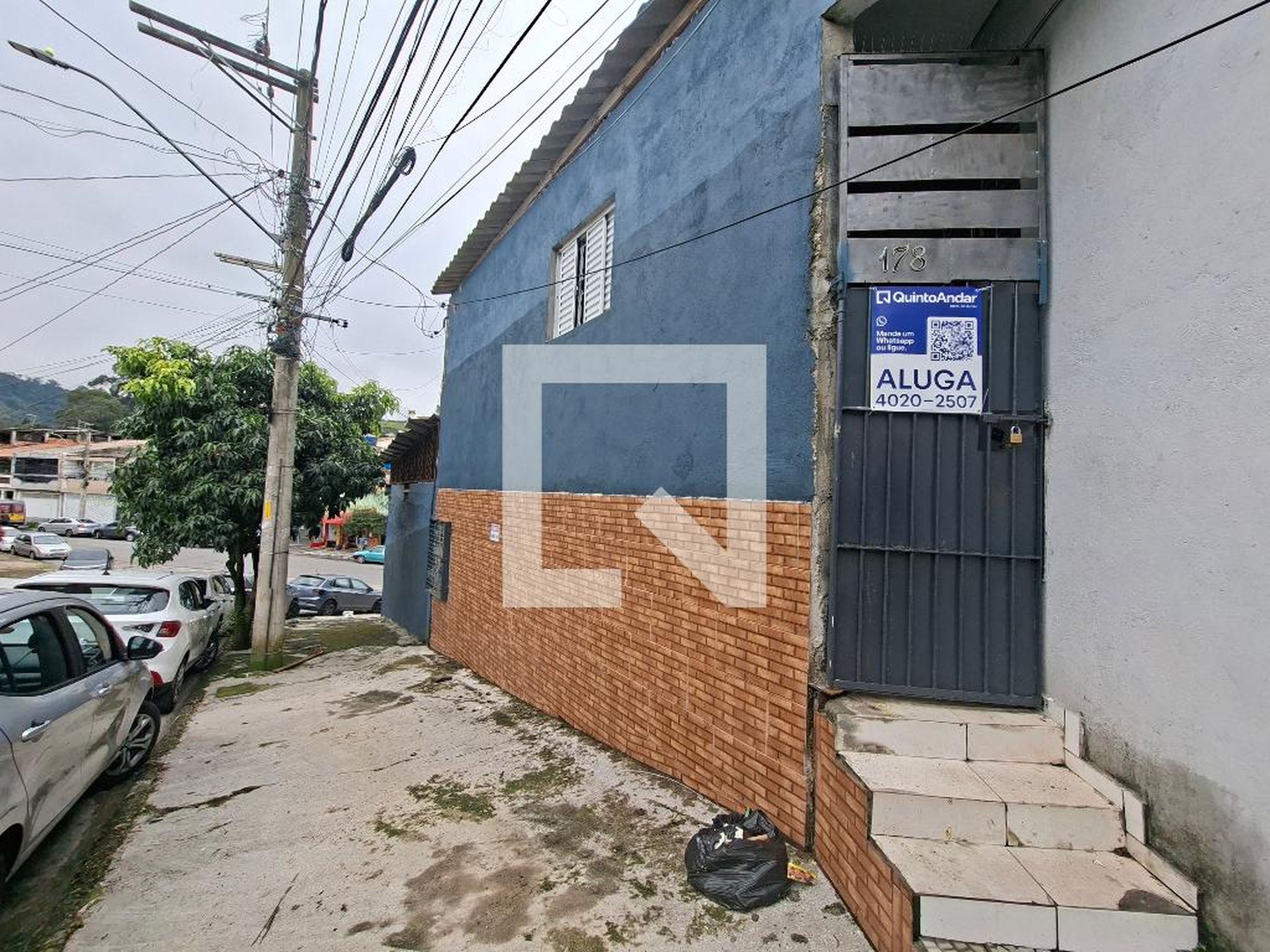 Fachada Condomínio em Rua Guido Arbeli, 178