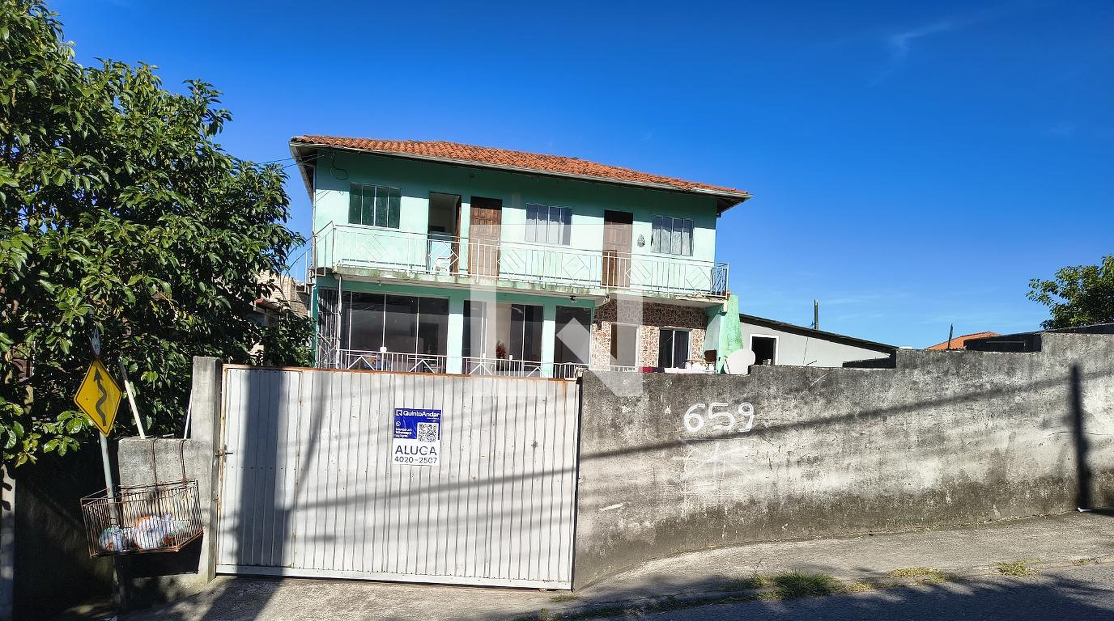 Fachada Condomínio em Rua Elías Merise, 659