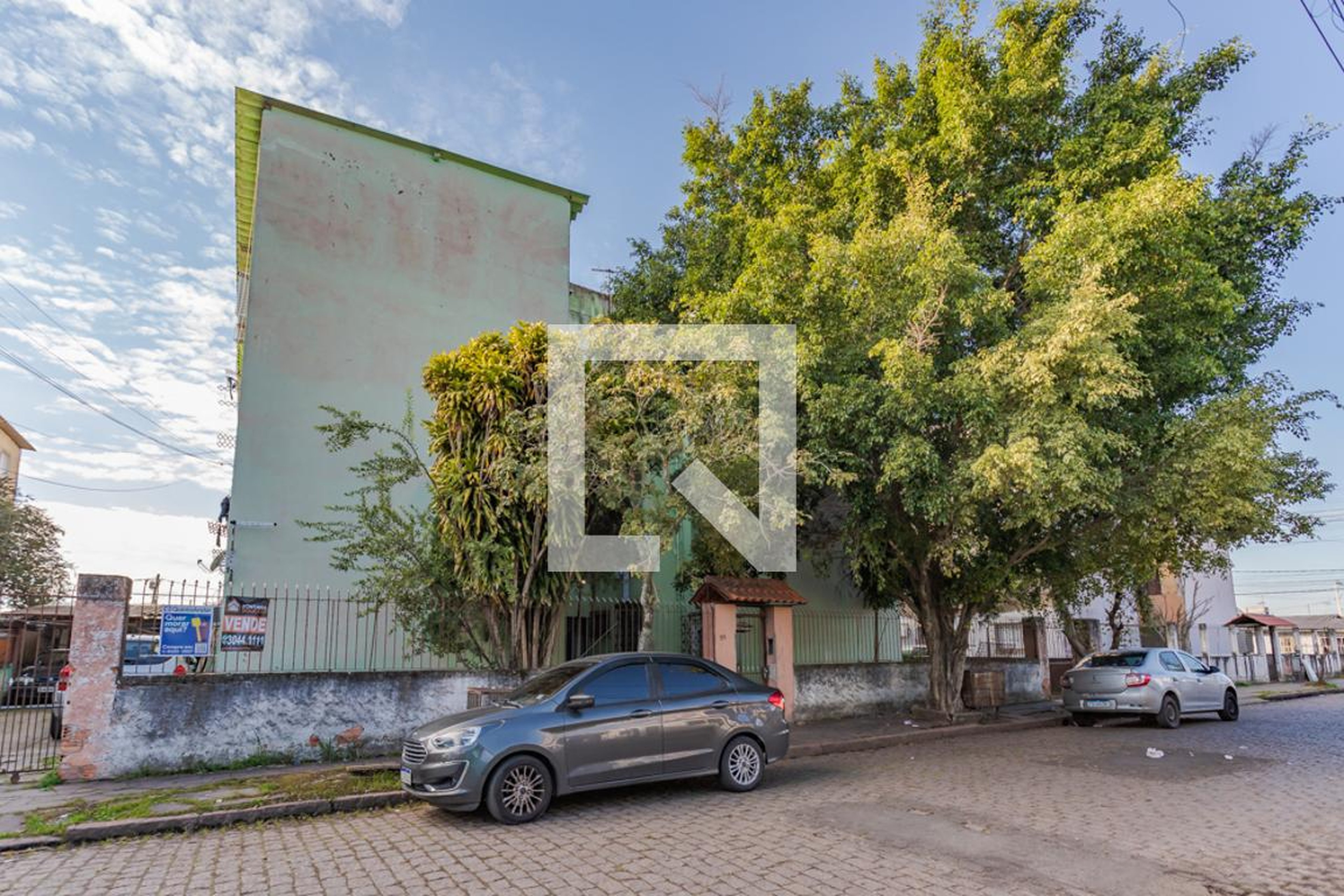 Fachada Condomínio em Rua Jacy Kroeff Milanez, 155