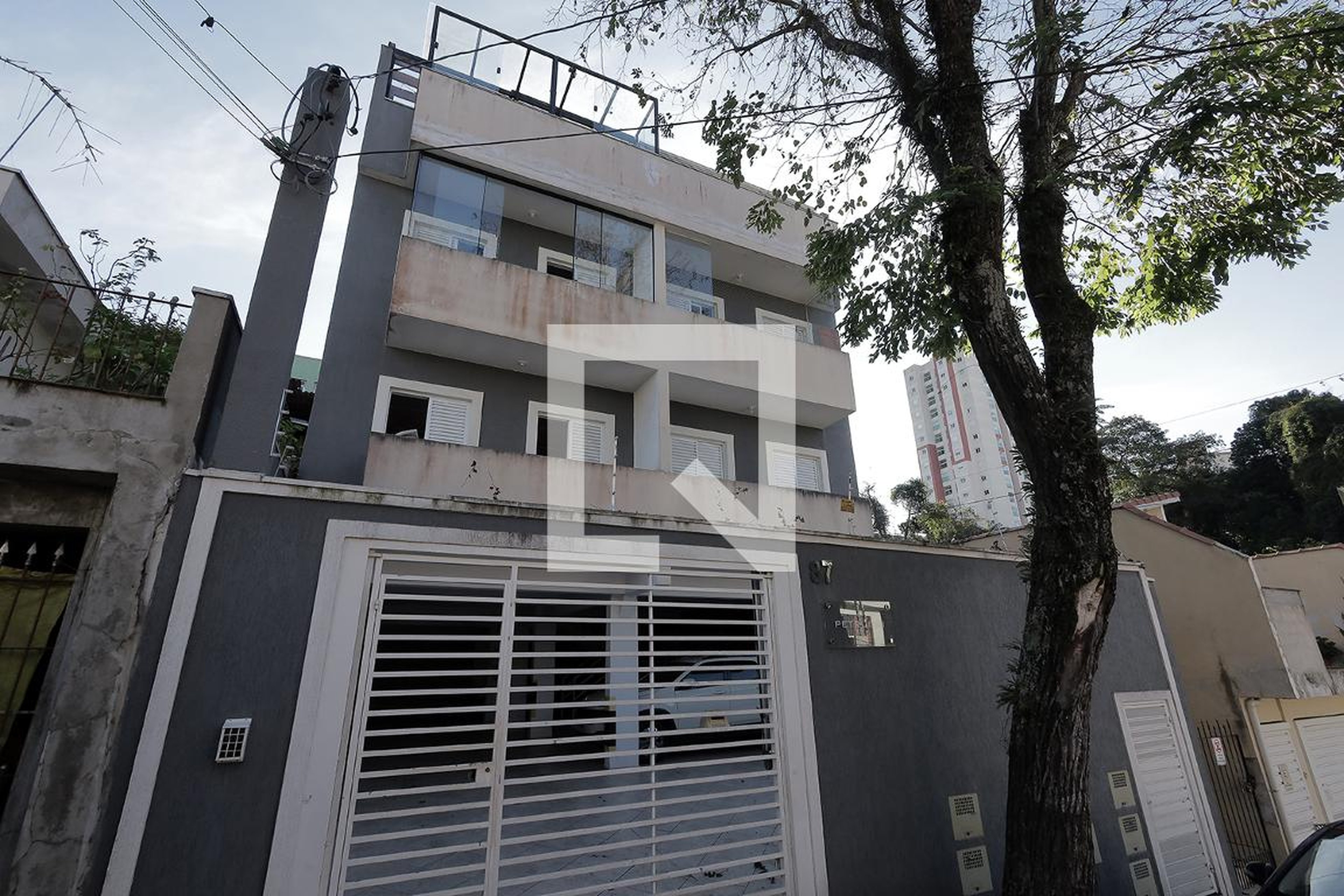 Fachada Condomínio em Rua José Pezolo, 87