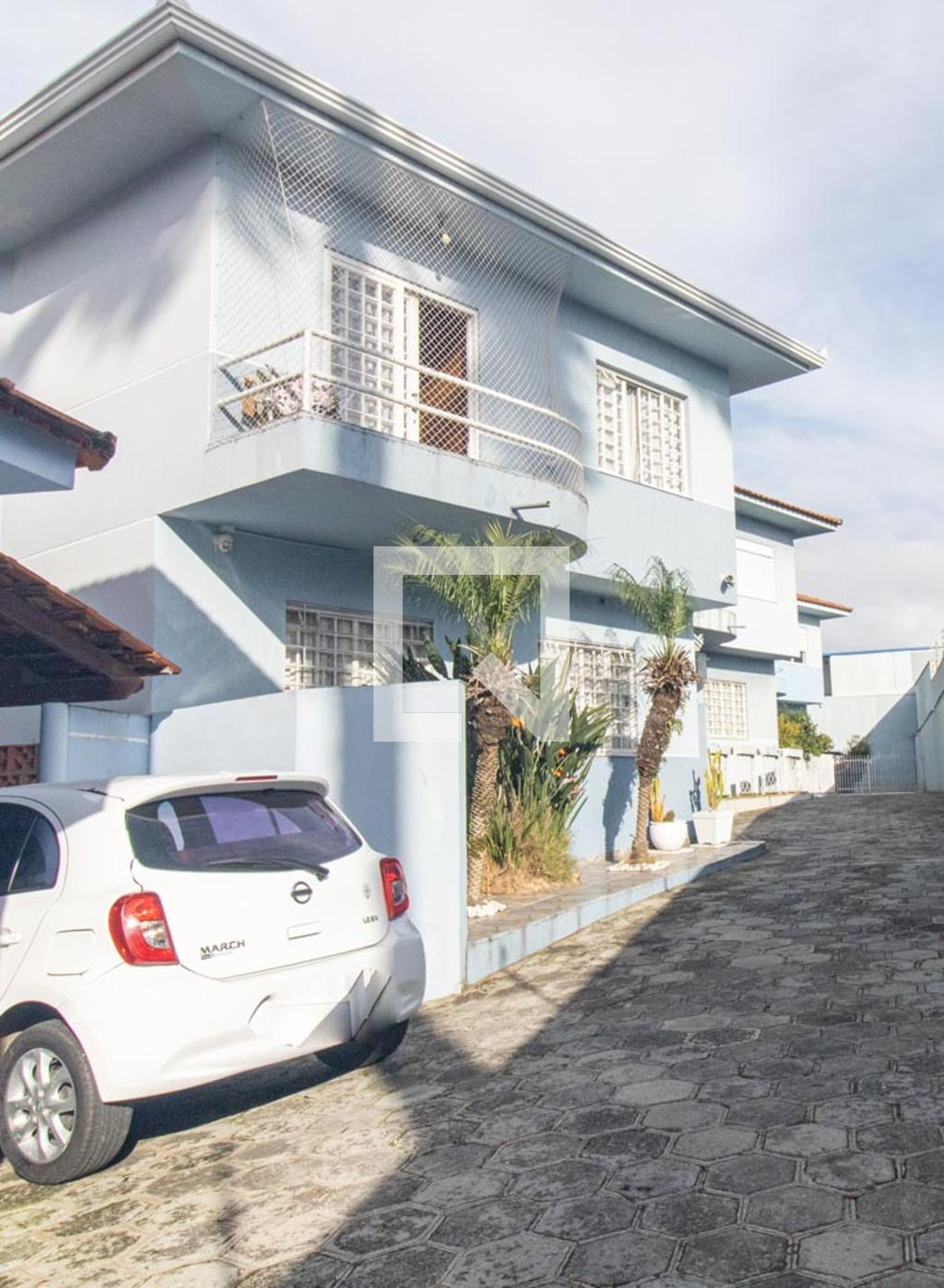 Fachada Condomínio em Rua Flávio Ribeiro, 299
