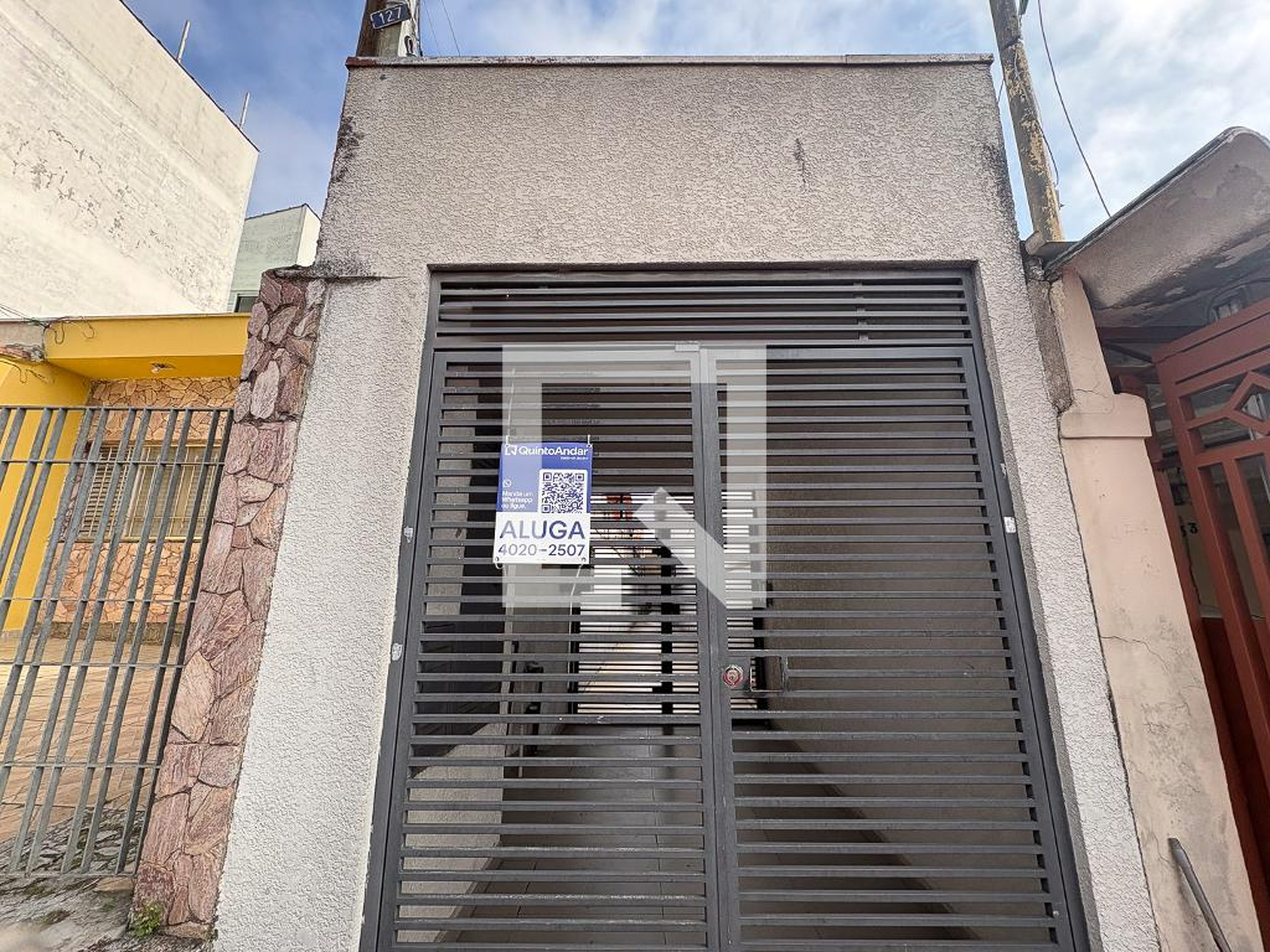 Fachada Condomínio em Rua das Verbenas, 127