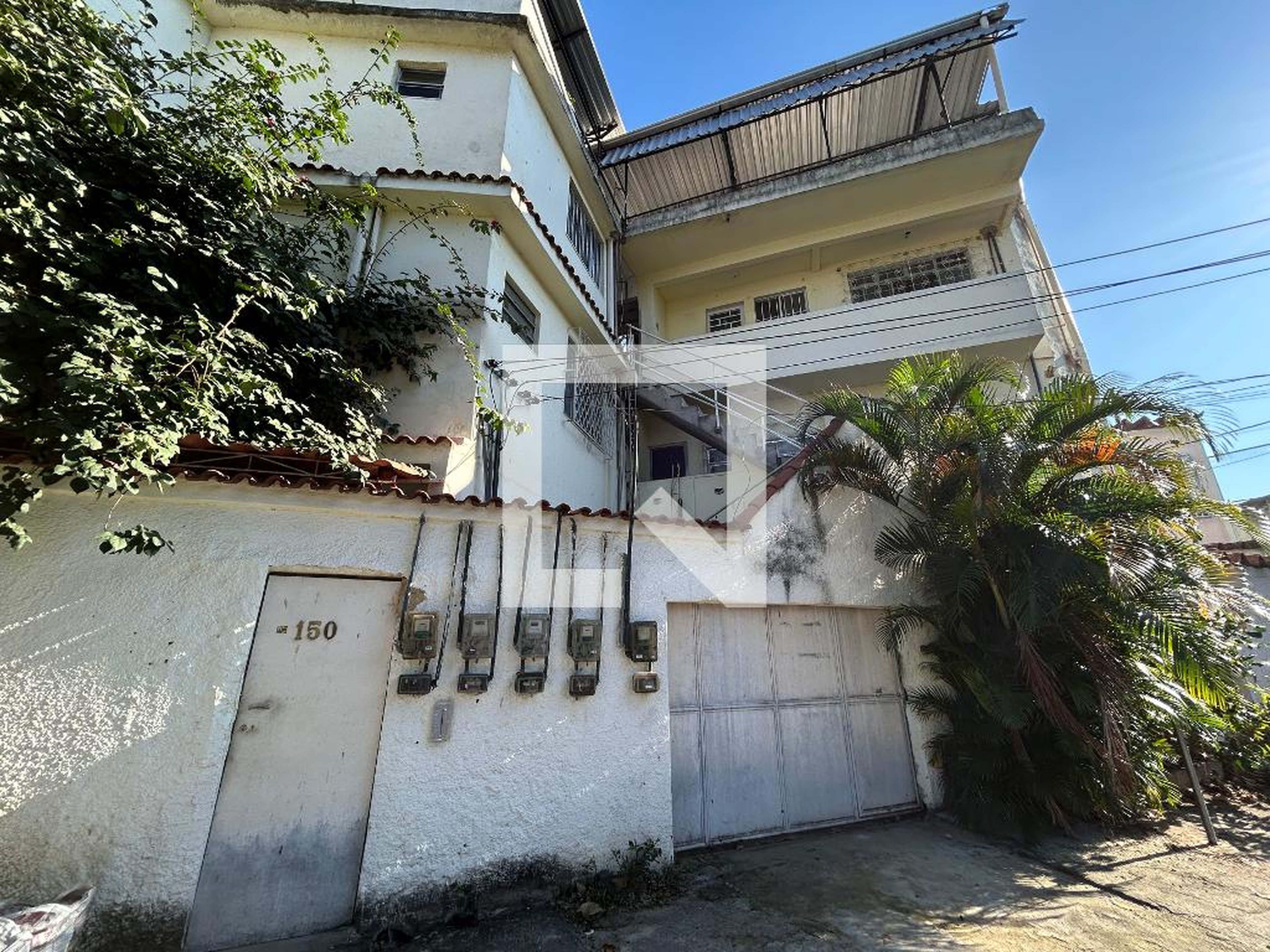 Fachada Condomínio em Rua Andrade Pinto, 150