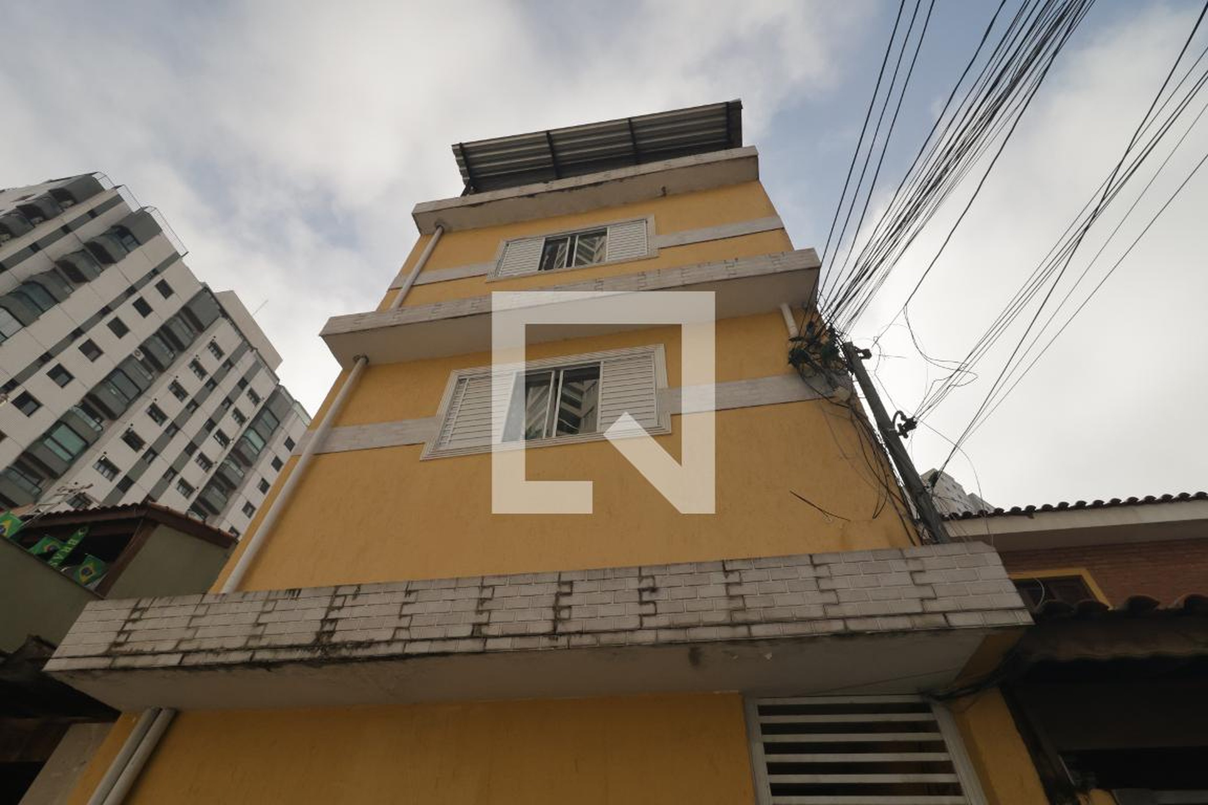 Fachada Condomínio em Rua Sabino, 239