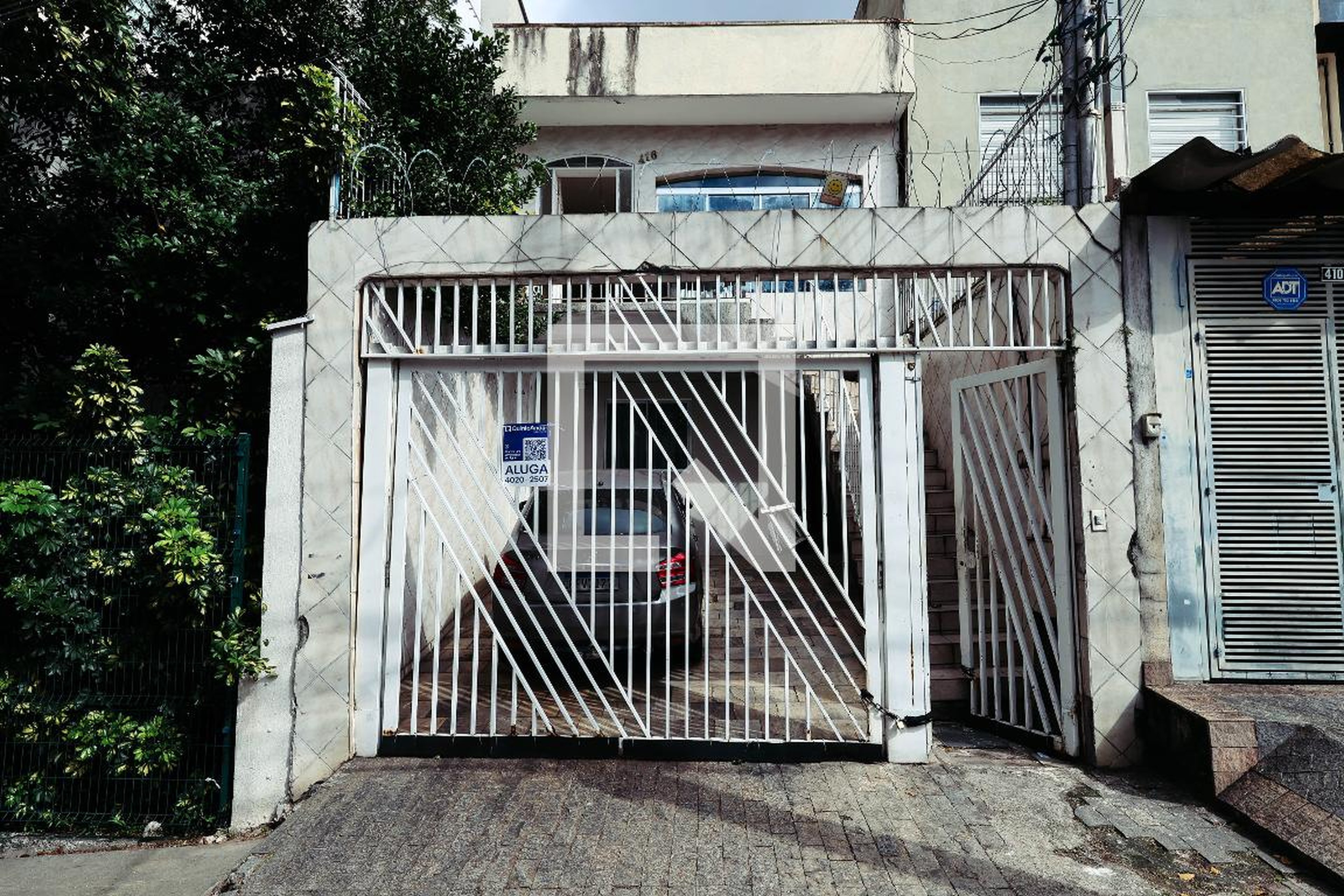 Fachada Condomínio em Rua Guimarães Passos, 416