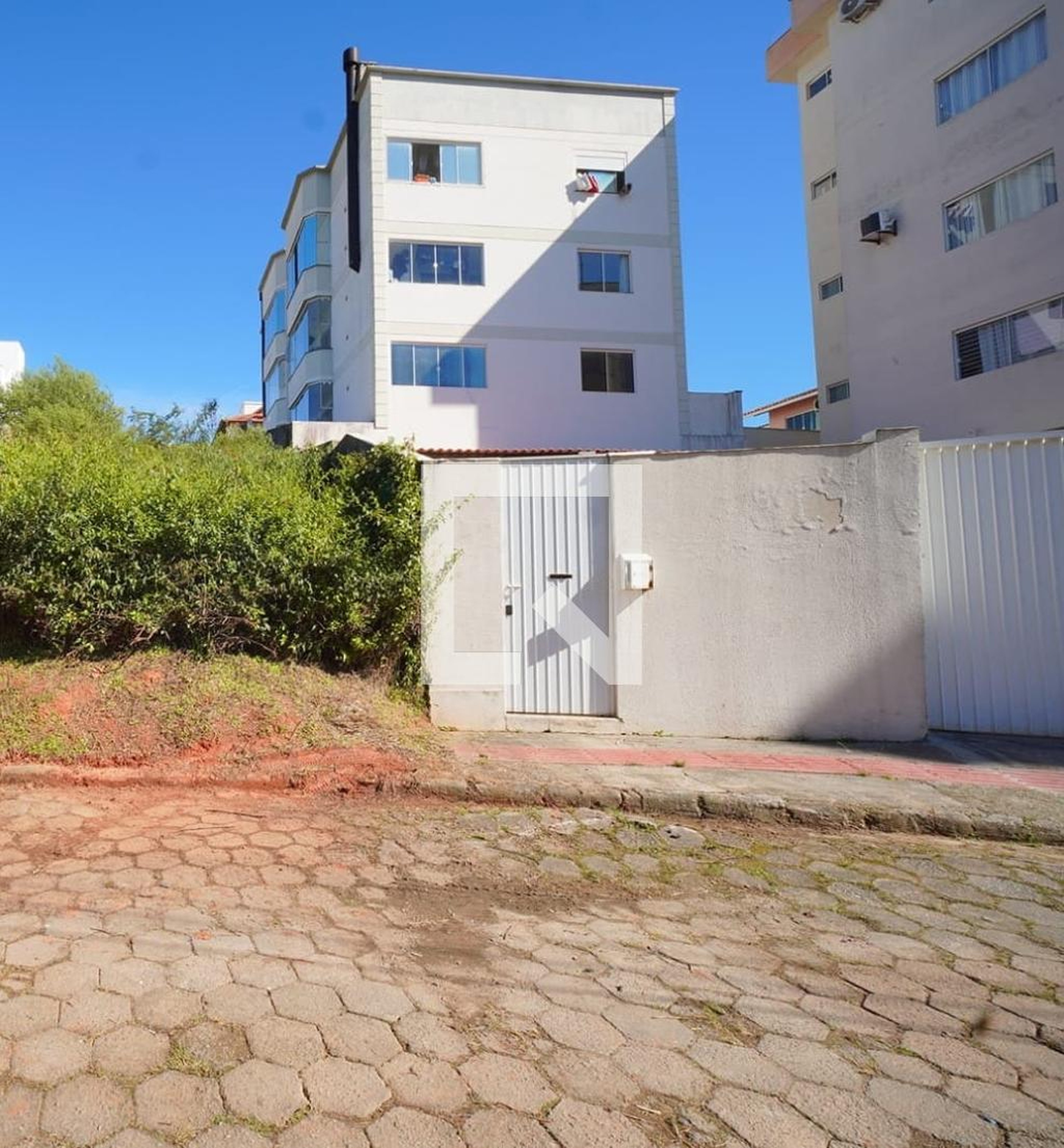 Fachada Condomínio em Rua João Affonso Firmino, 32