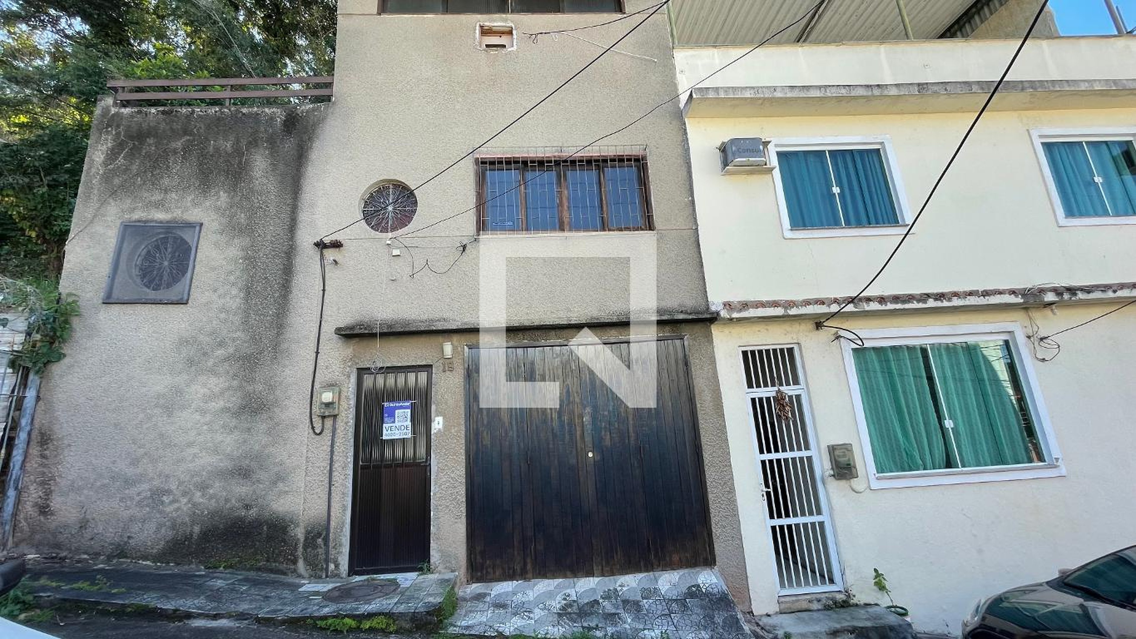 Fachada Condomínio em Rua Manuel Pereira da Costa, 28