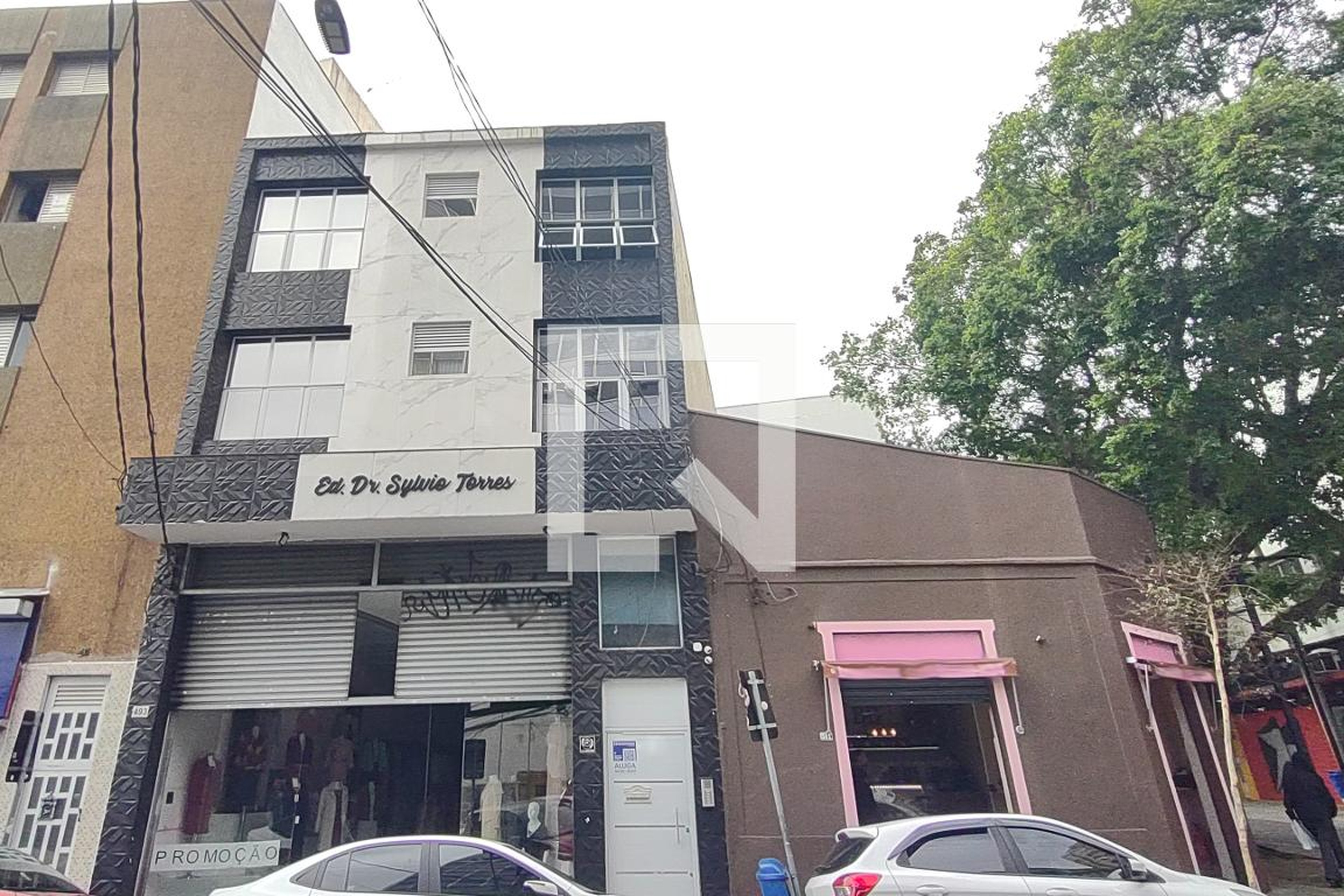 Fachada Condomínio em Rua Manoel Coelho, 497