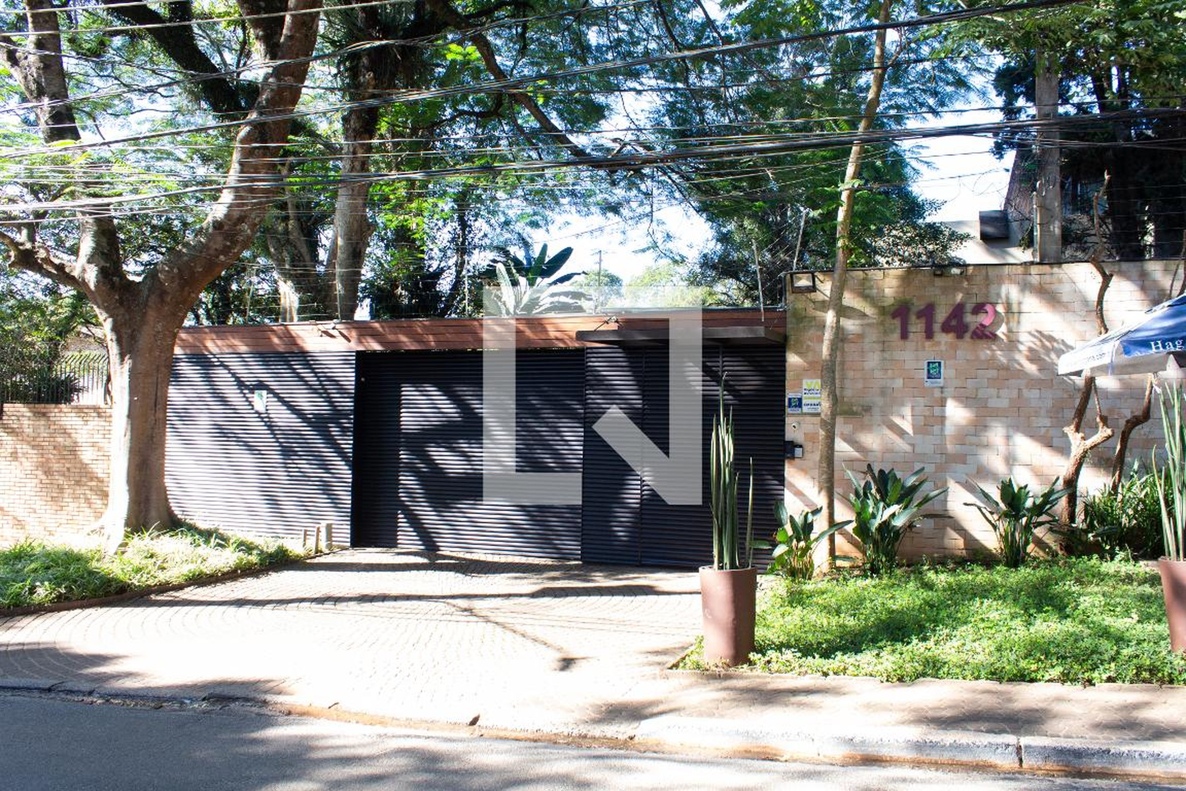 Fachada Condomínio Vila Flora