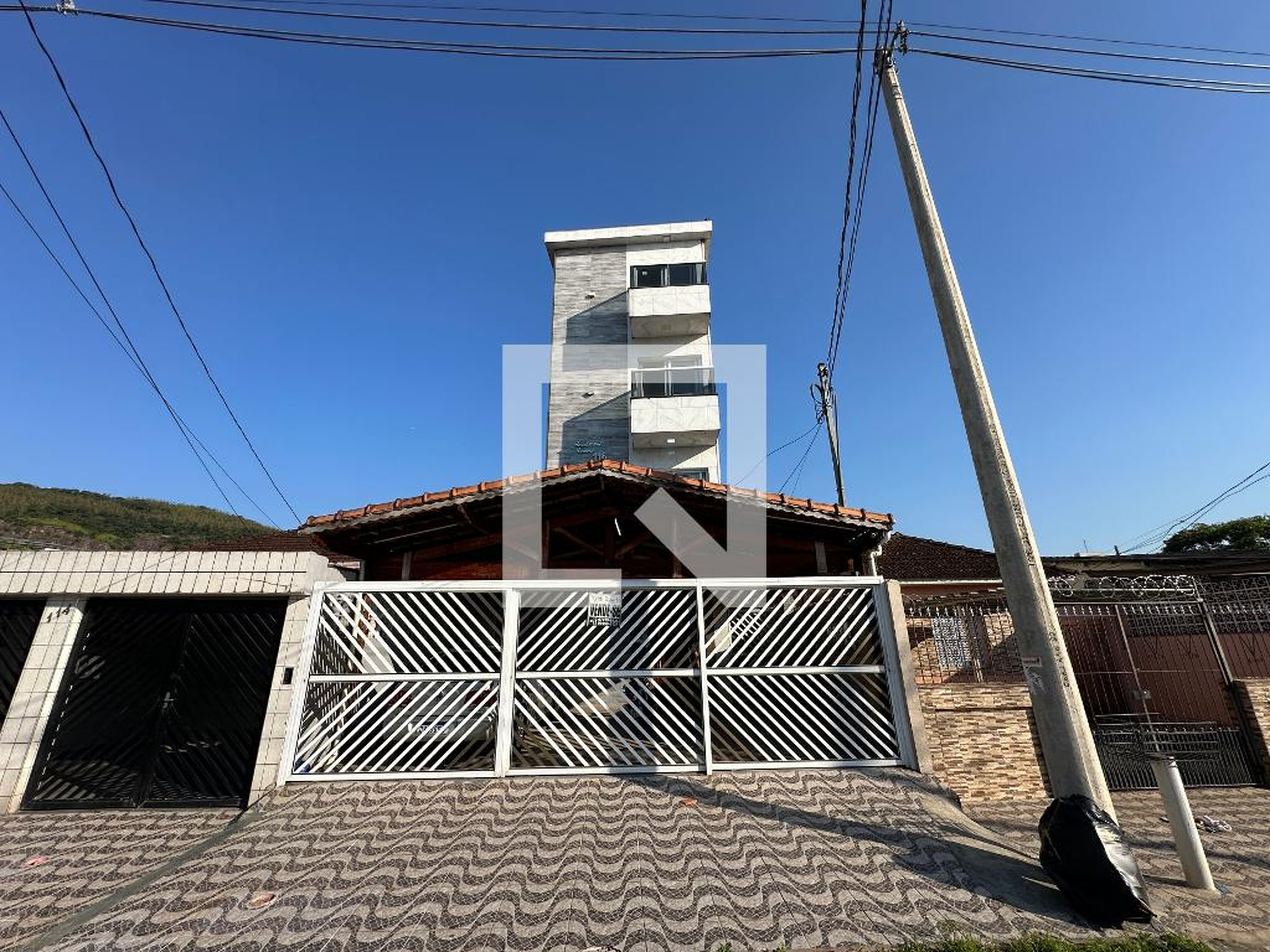 Fachada Condomínio em Rua Mantenópolis, 116