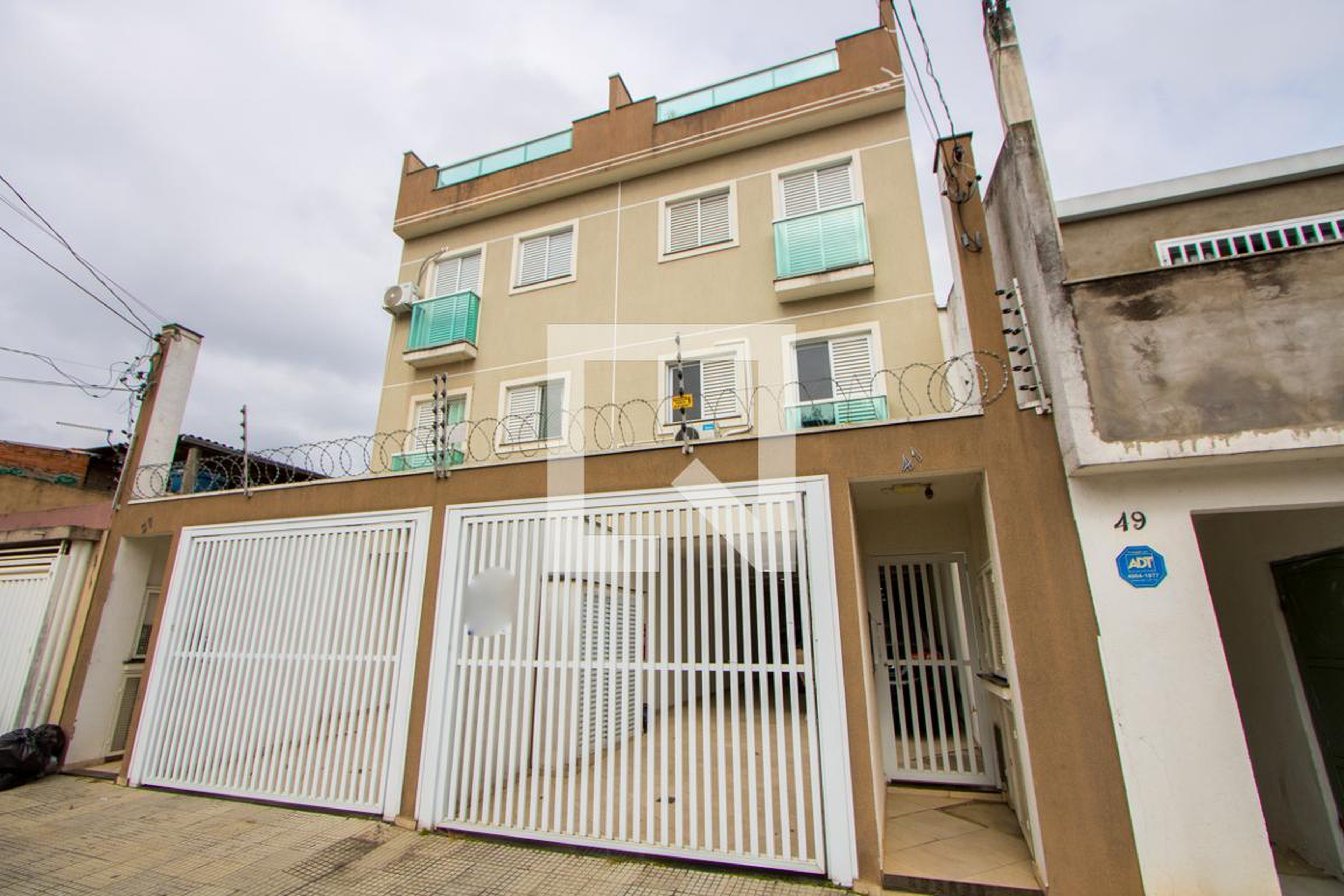 Fachada Condomínio em Rua Senador Dantas, 41
