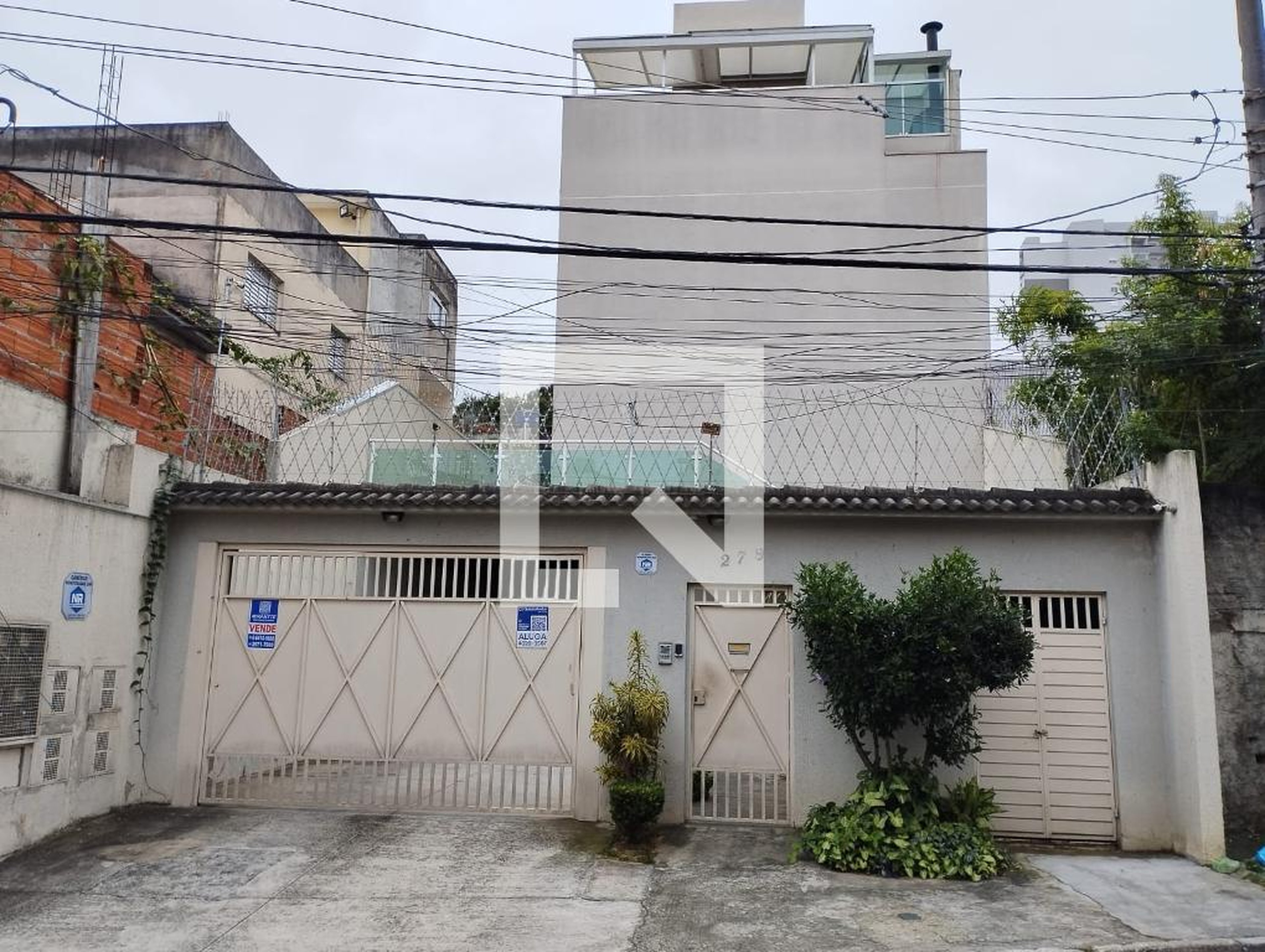 Fachada Condomínio em Rua Júlio Rodrigues Mendes, 279