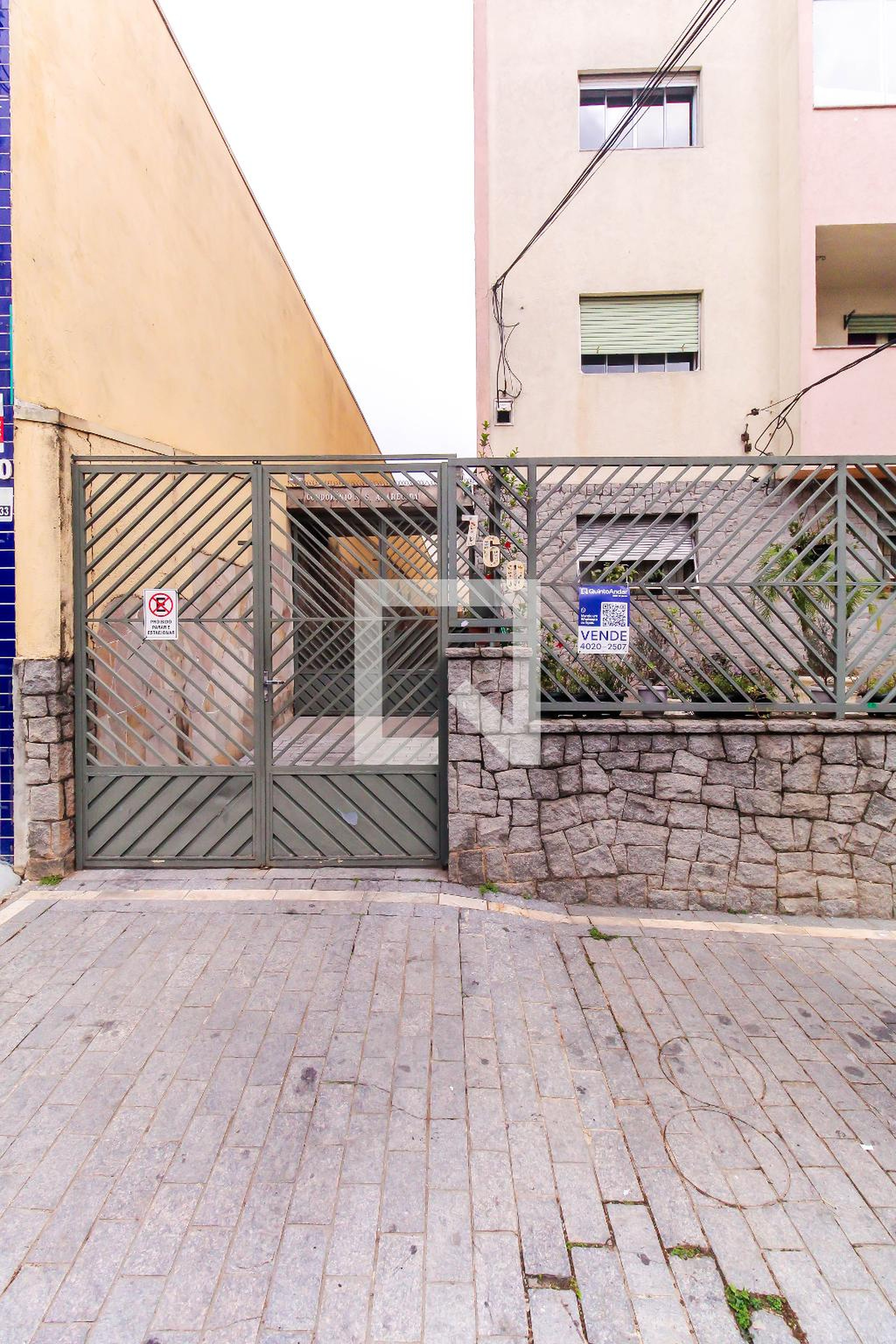 Fachada Condomínio em Rua Padre Raposo, 760