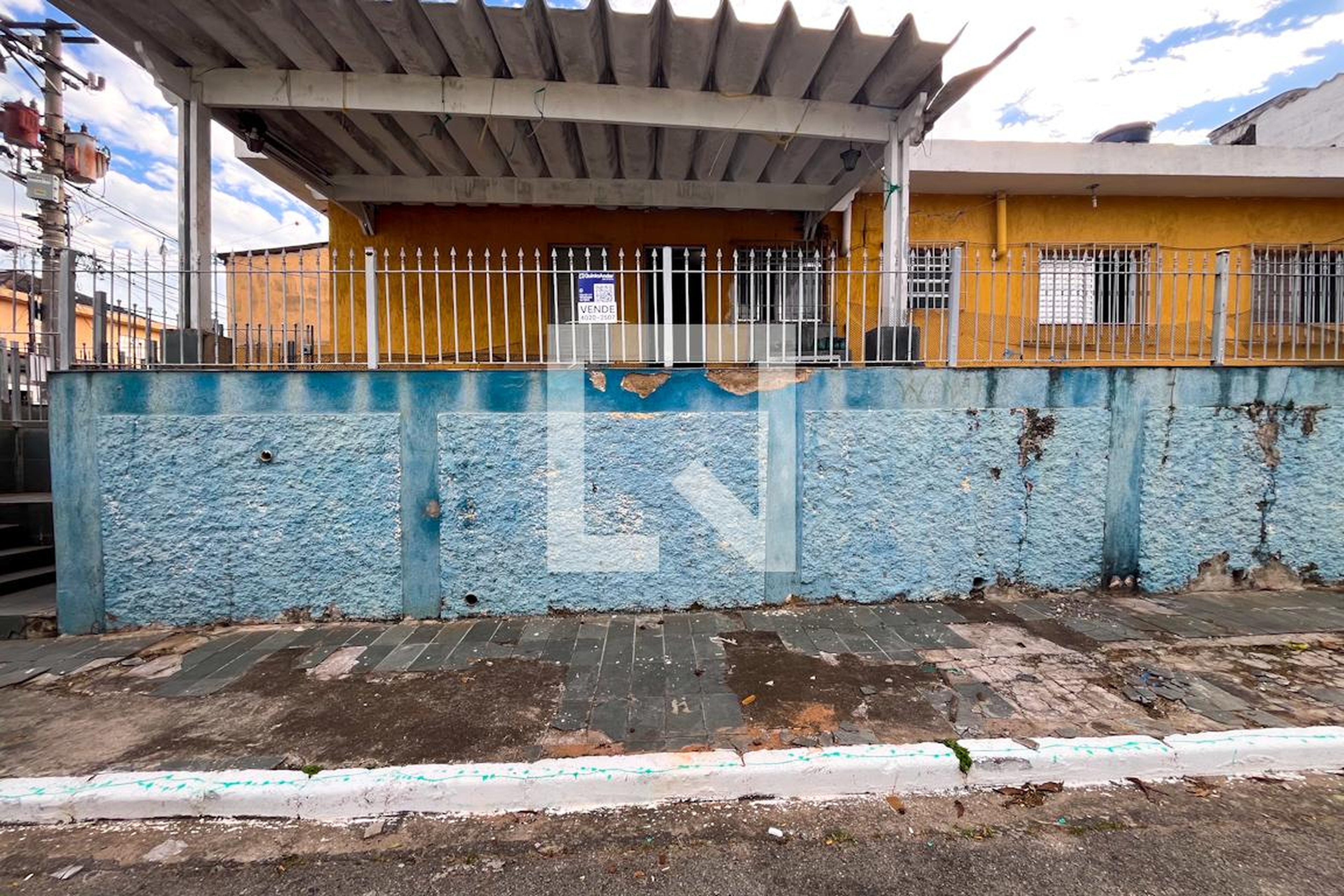 Fachada Condomínio em Rua Brasílio de Oliveira, 227