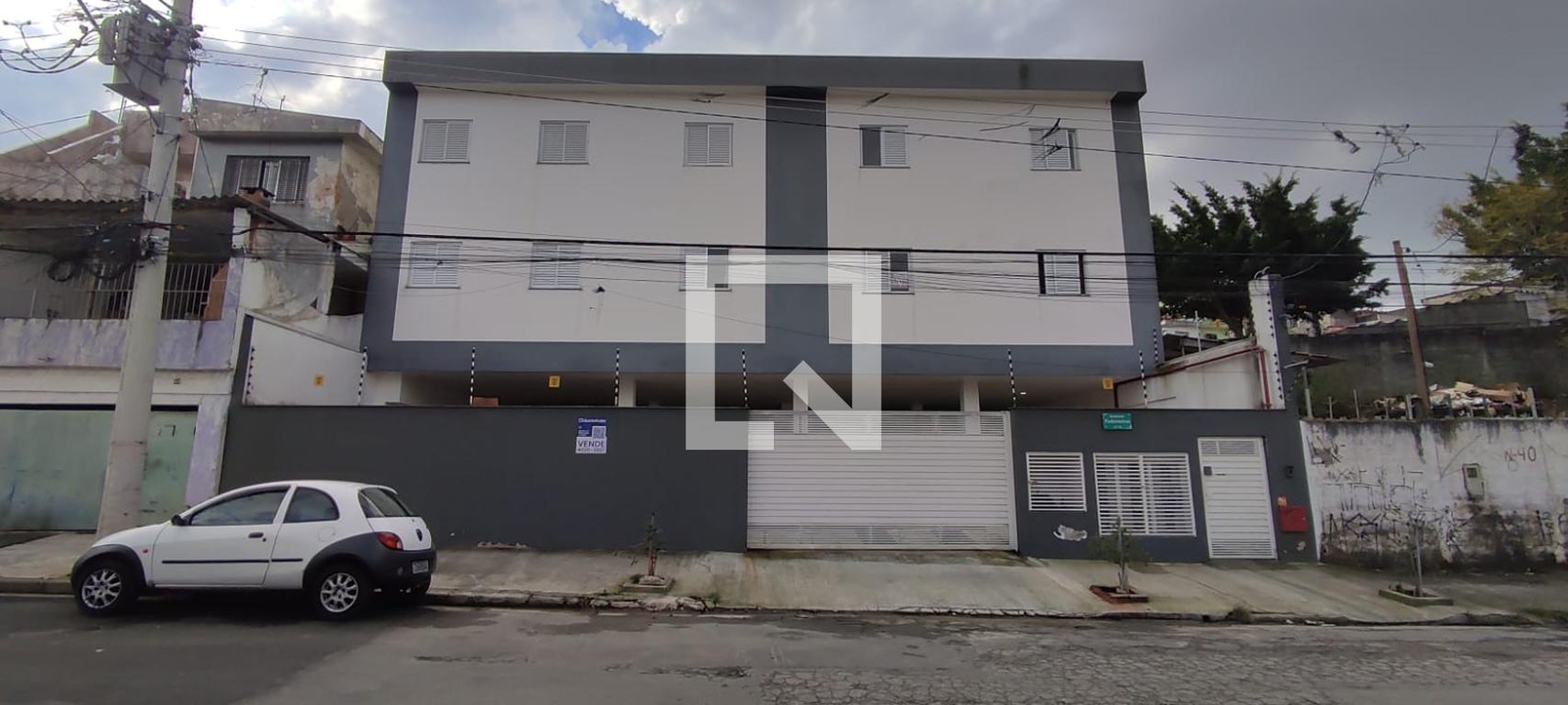 Fachada Condomínio em Rua Pederneiras, 26