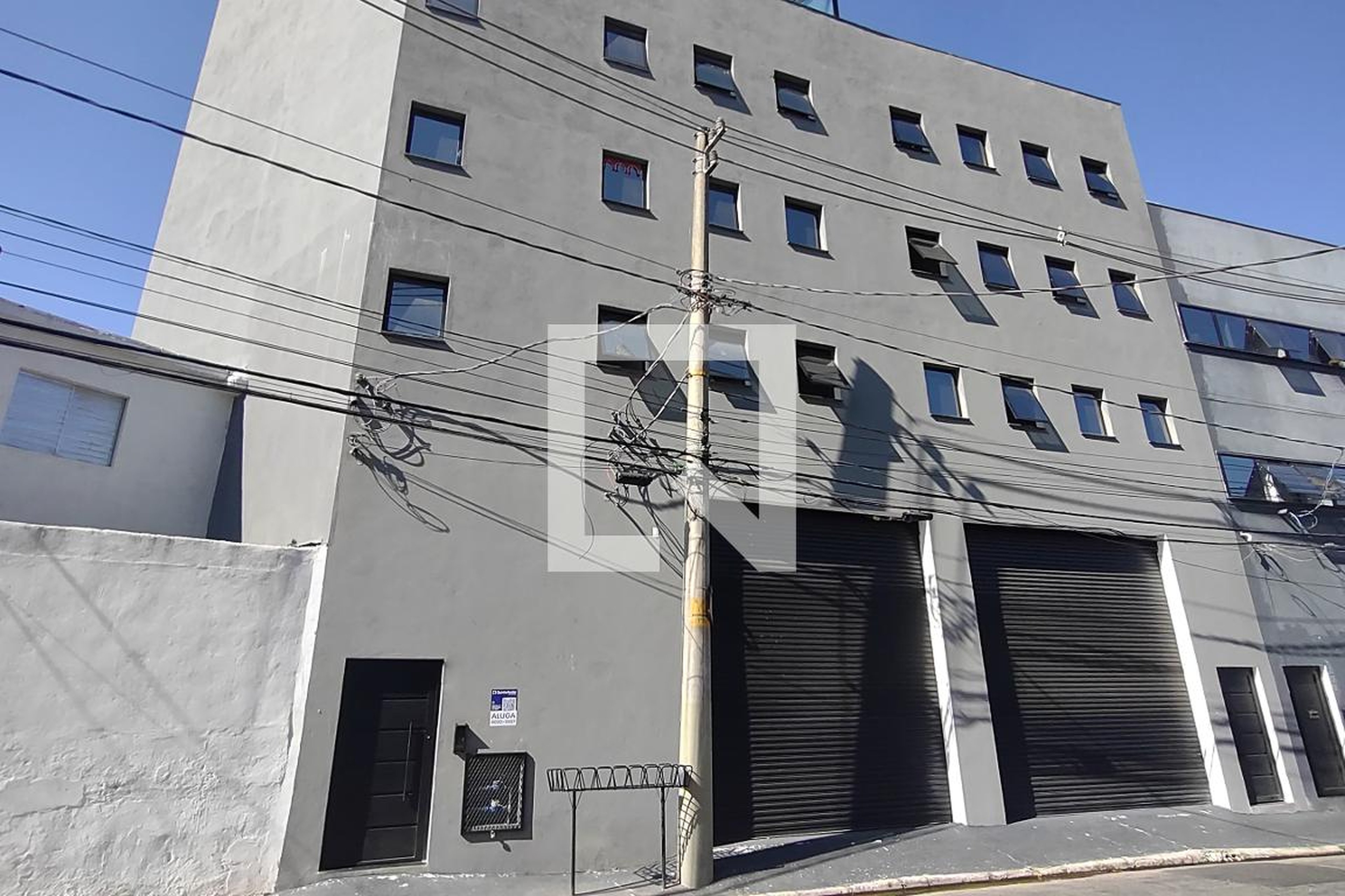 Fachada Condomínio em Rua Washington Luís, 205