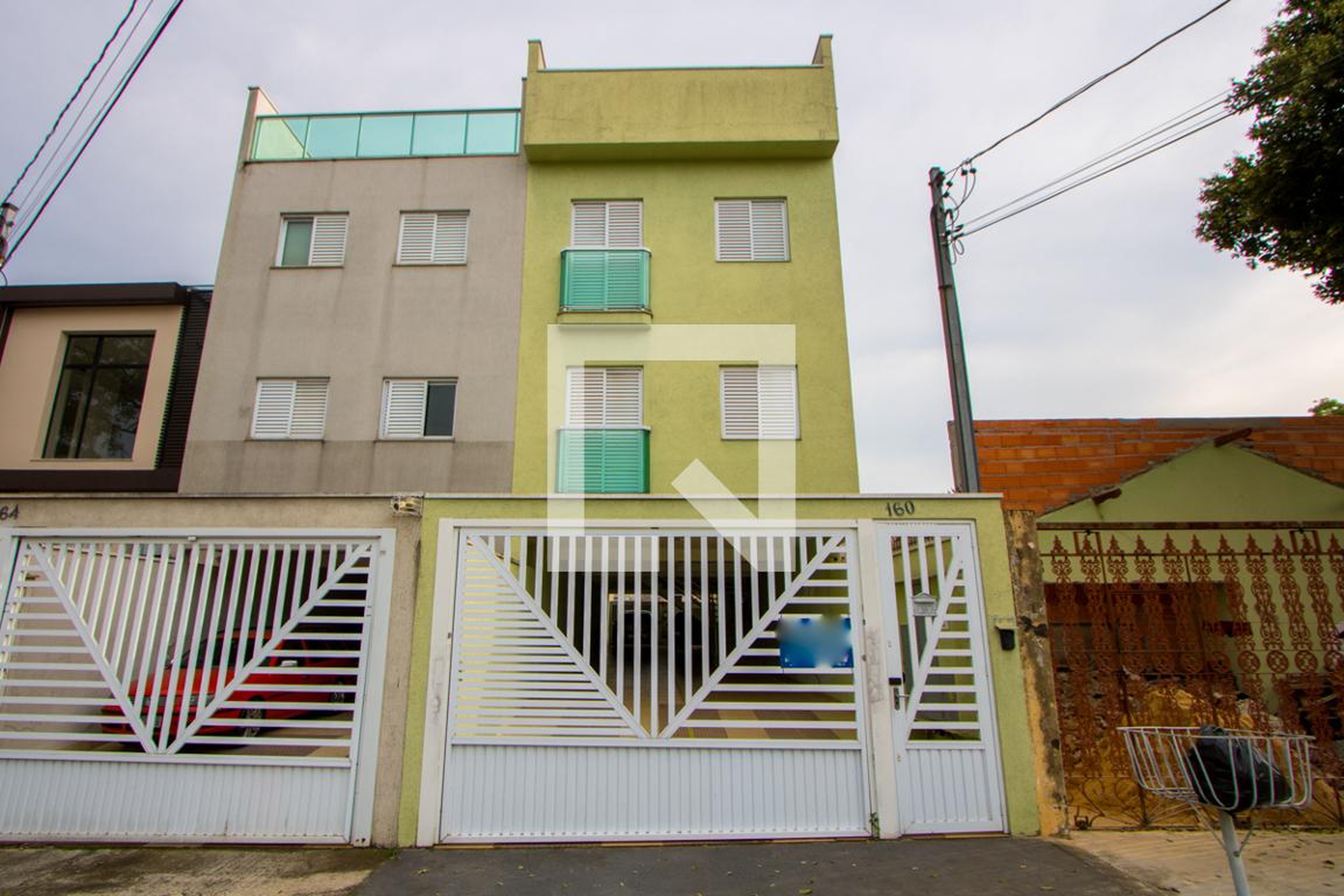 Fachada Condomínio em Rua Odilon Braga, 160