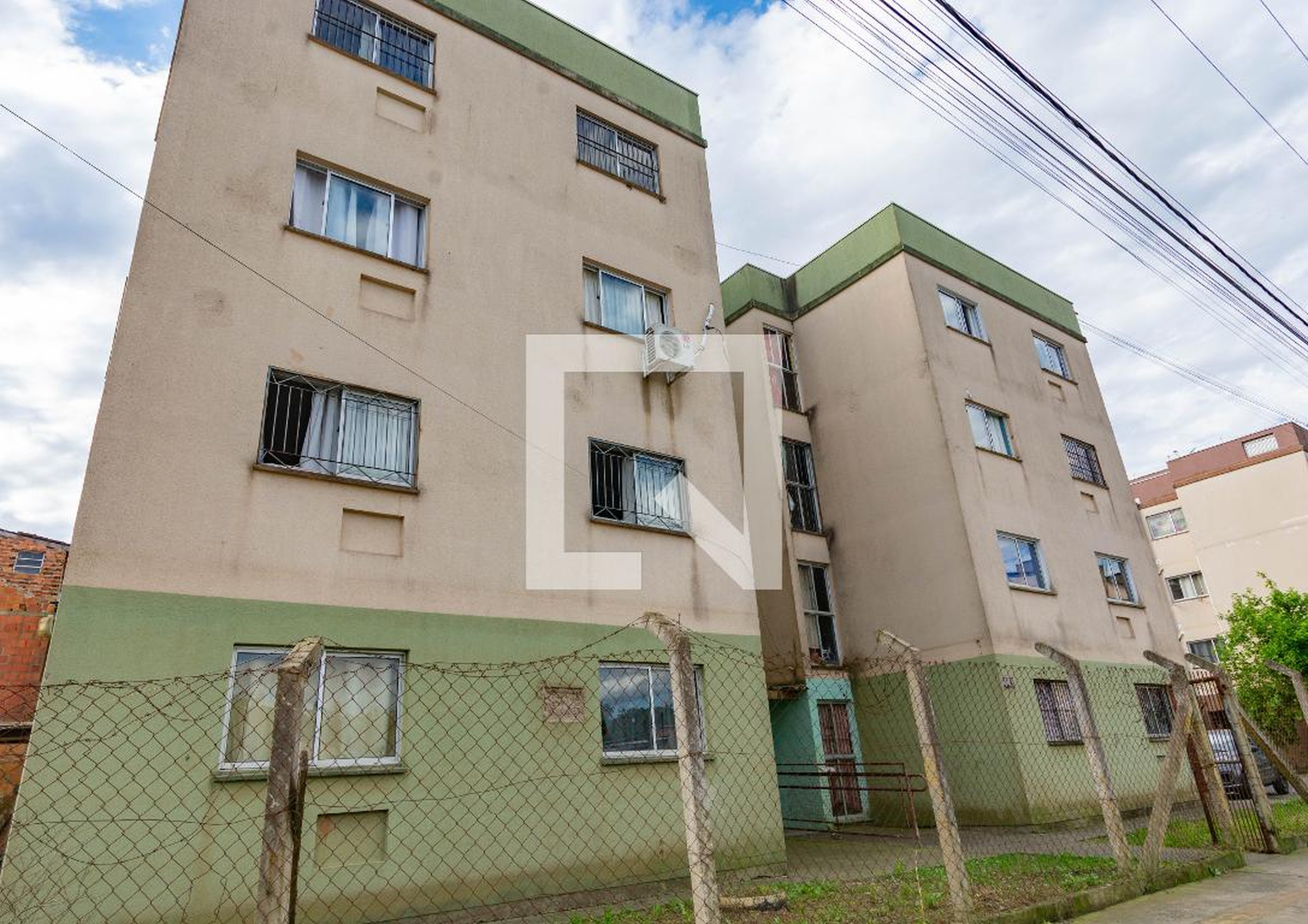 Fachada Condomínio em Rua Braulino Pansera, 445