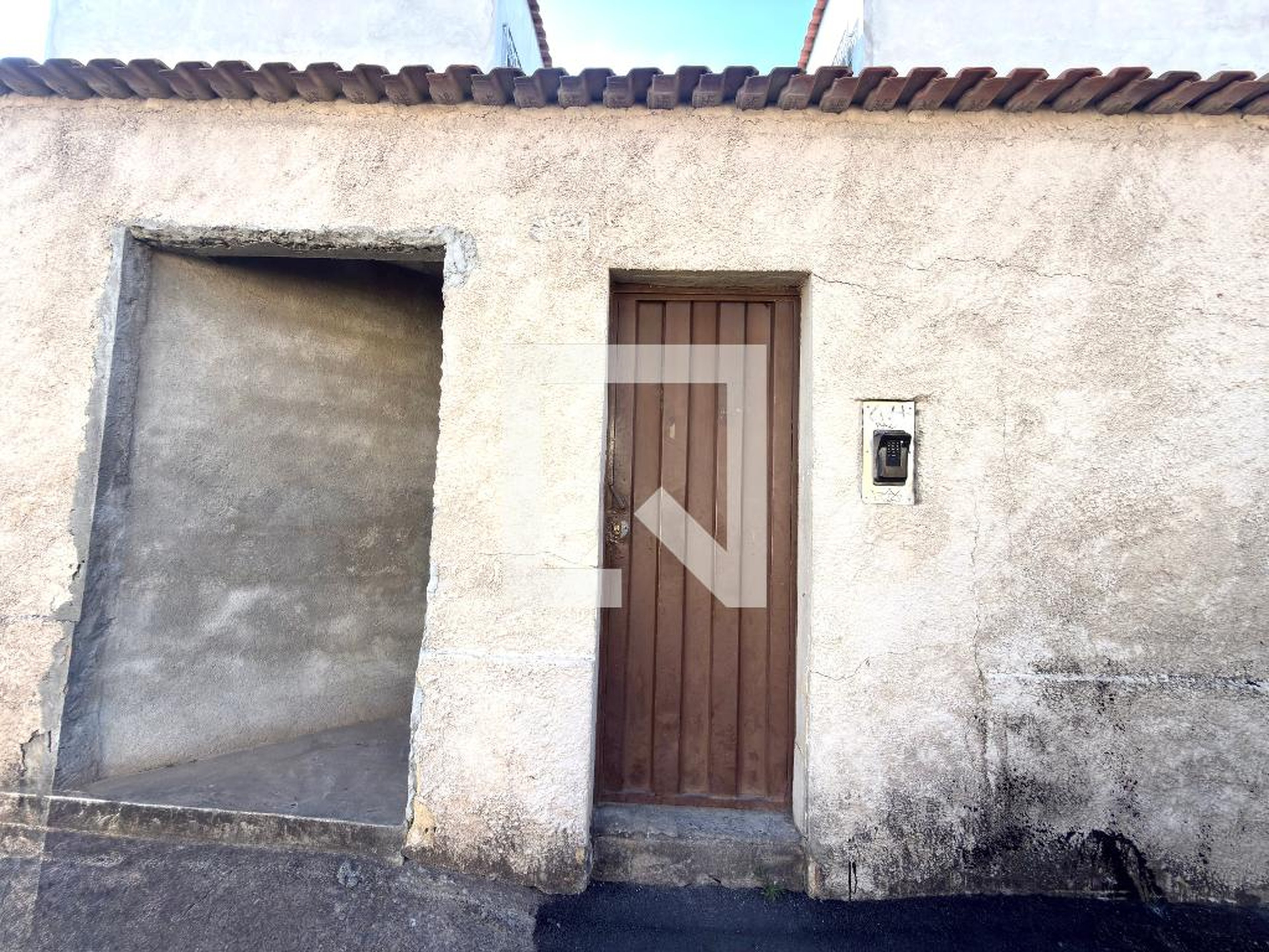 Fachada Condomínio em Rua Itambacury, 356