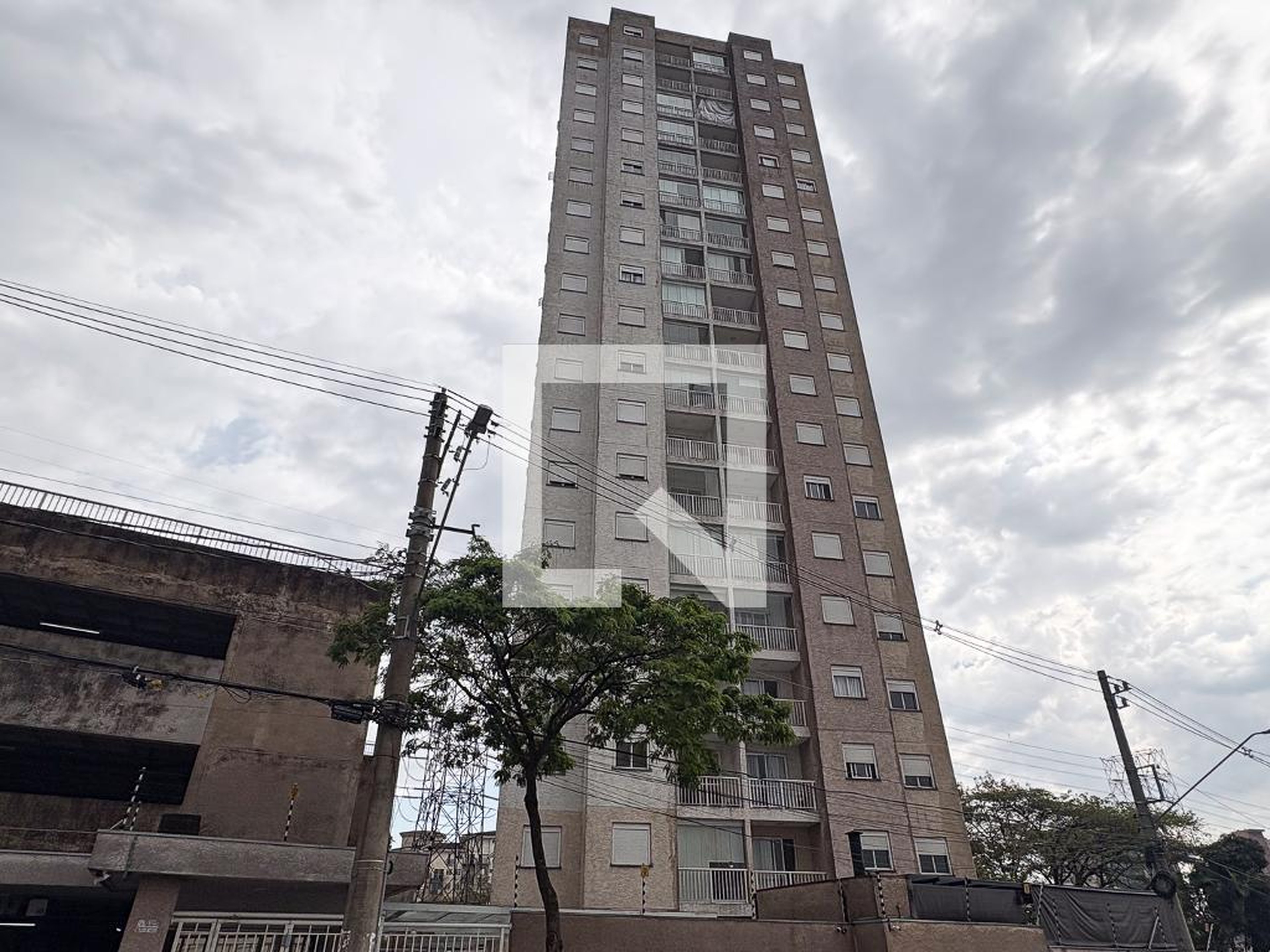 Fachada Condomínio New in Spot