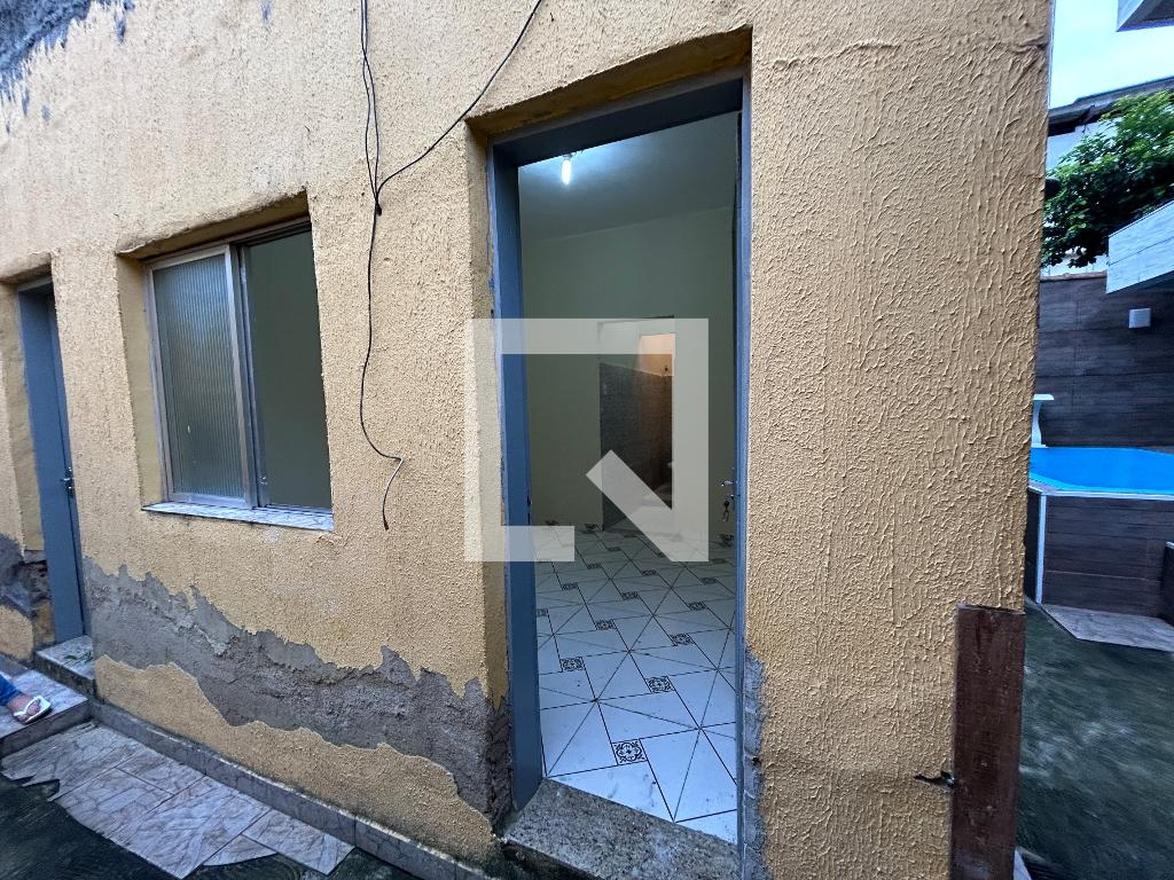 Fachada Condomínio em Rua Comendador Pinto, 314