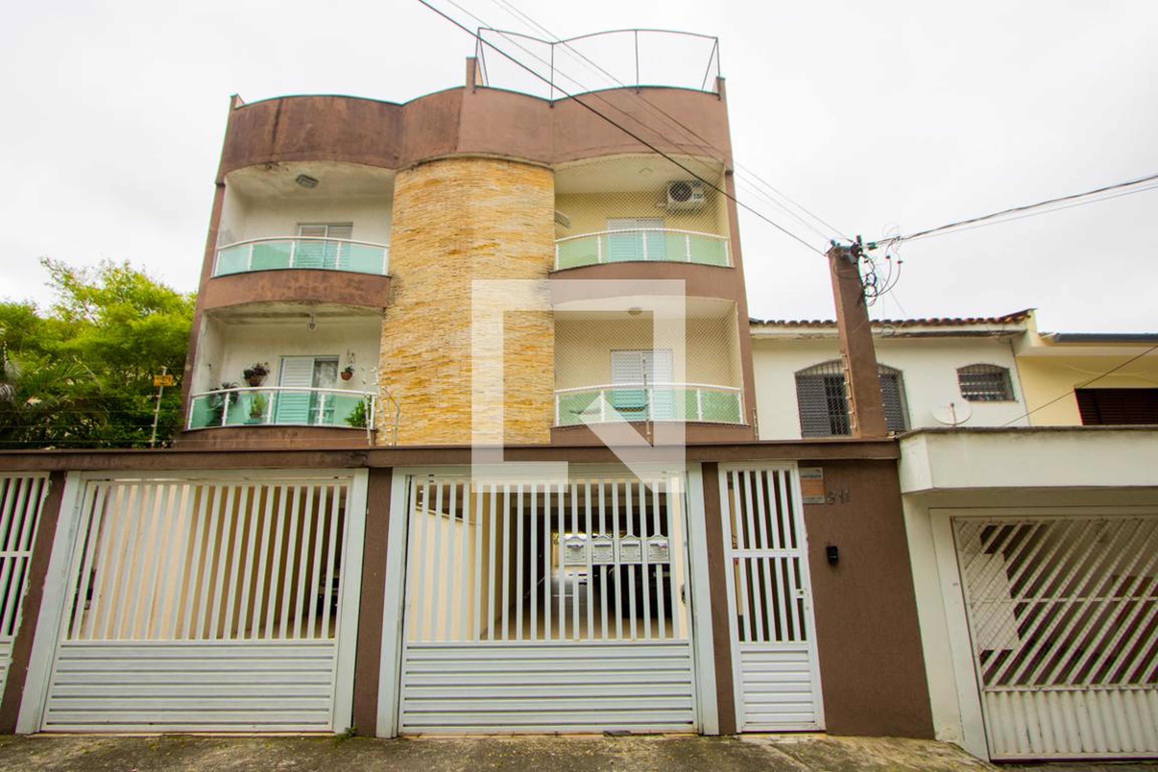 Fachada Condomínio em Rua Tupinambás, 311