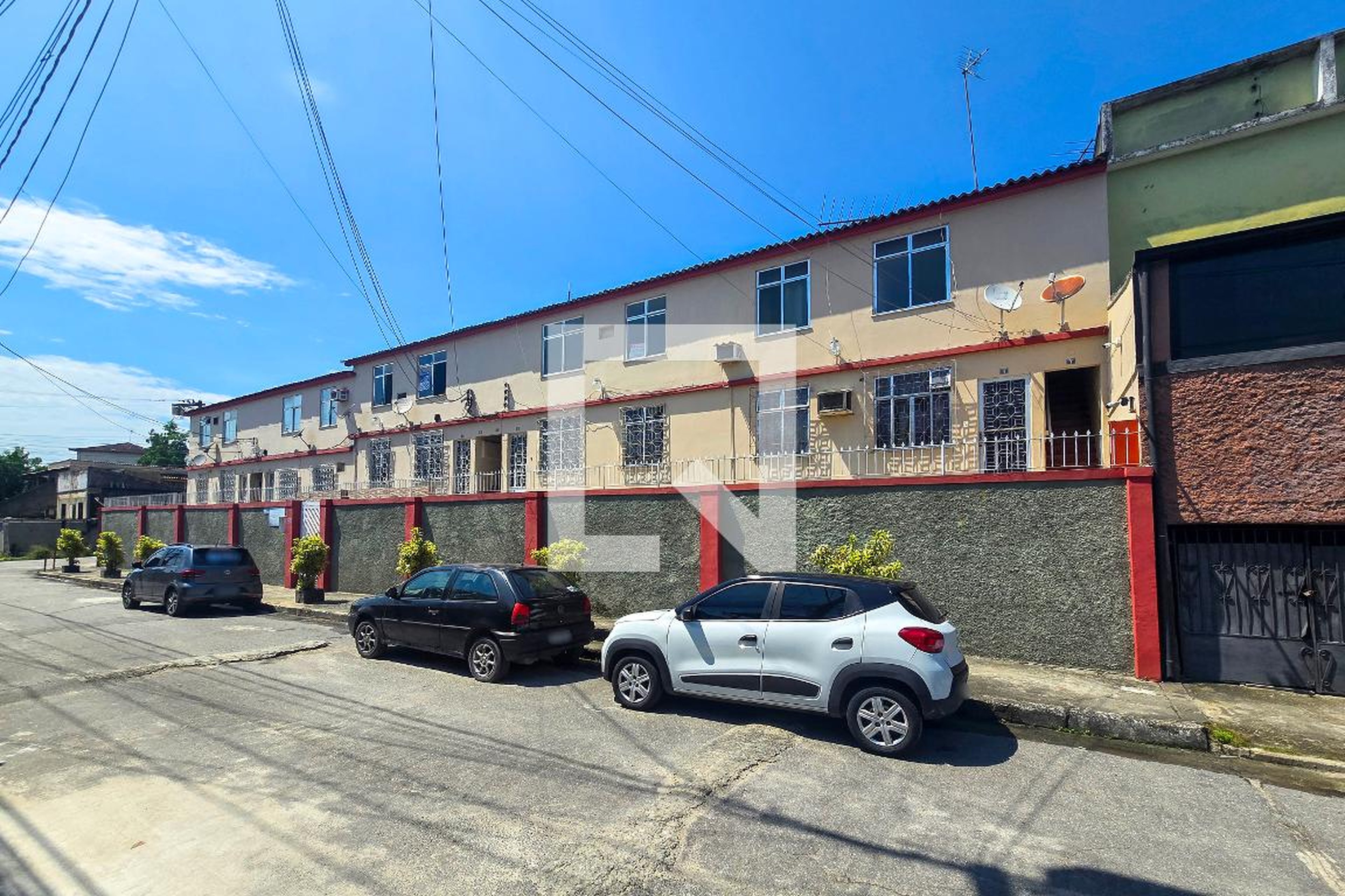 Fachada Condomínio em Rua Eunezio, 28