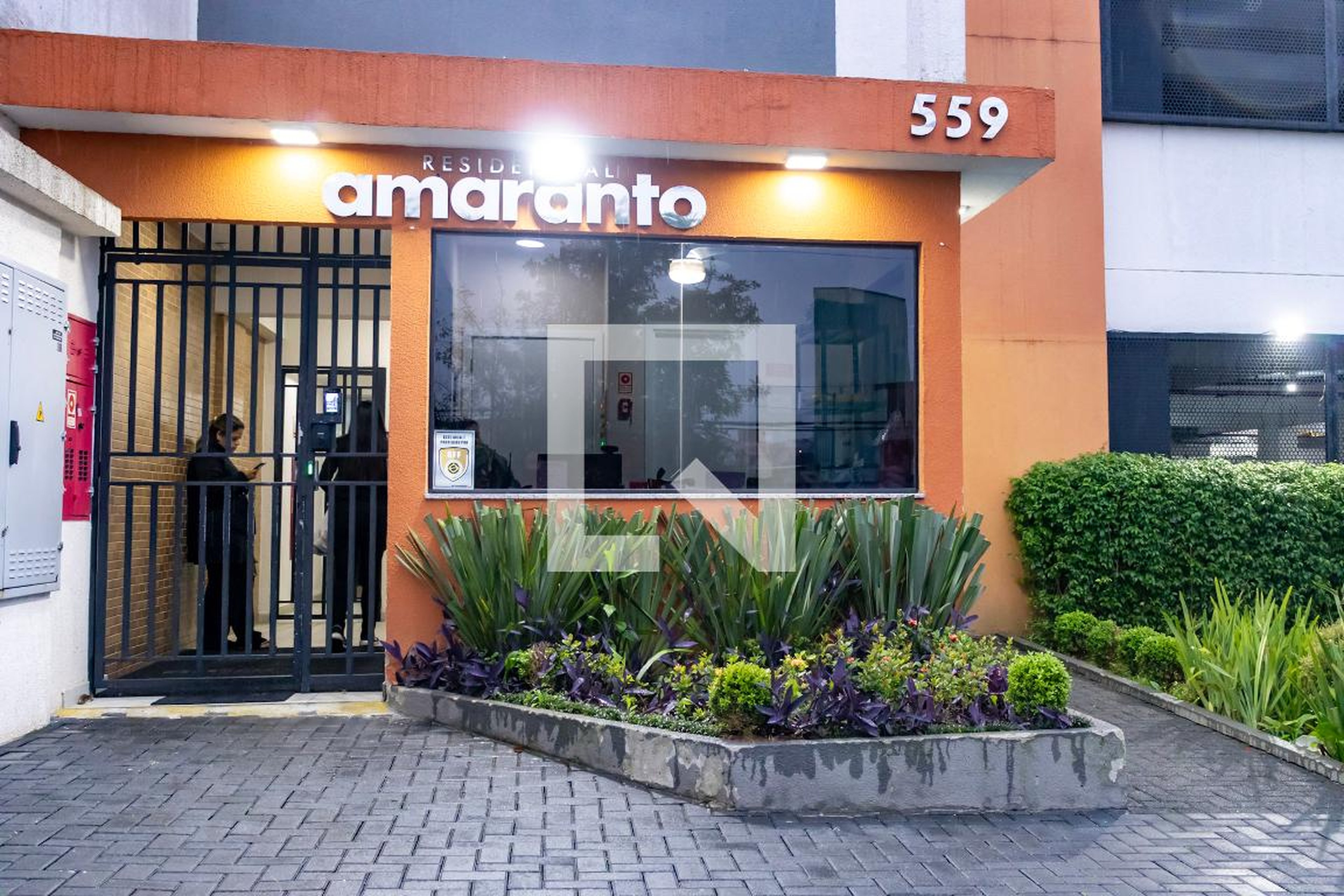 Fachada Condomínio em Rua Alonso Vasconcelos Pacheco, 599