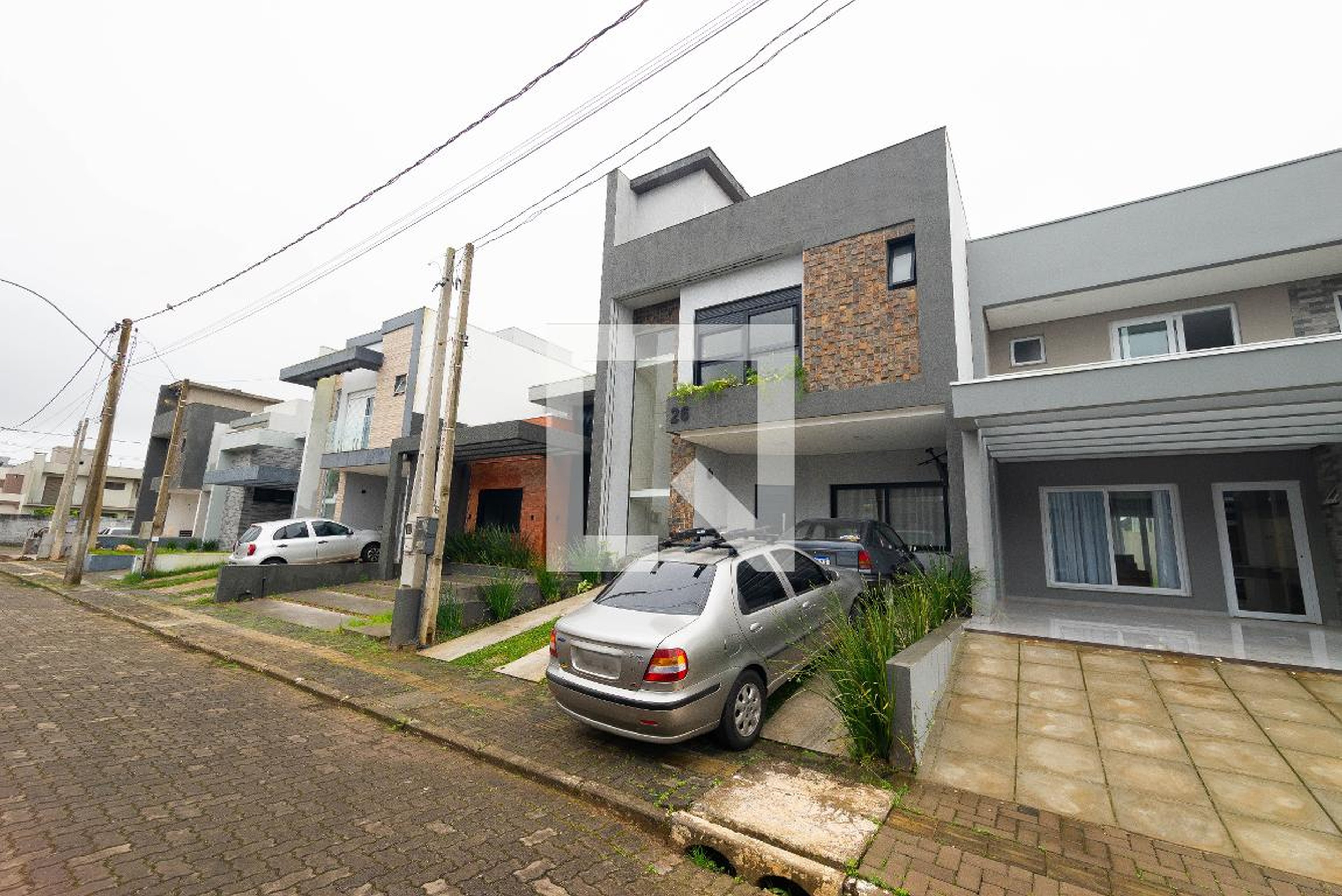 Fachada Condomínio em Rua das Camélias, 329