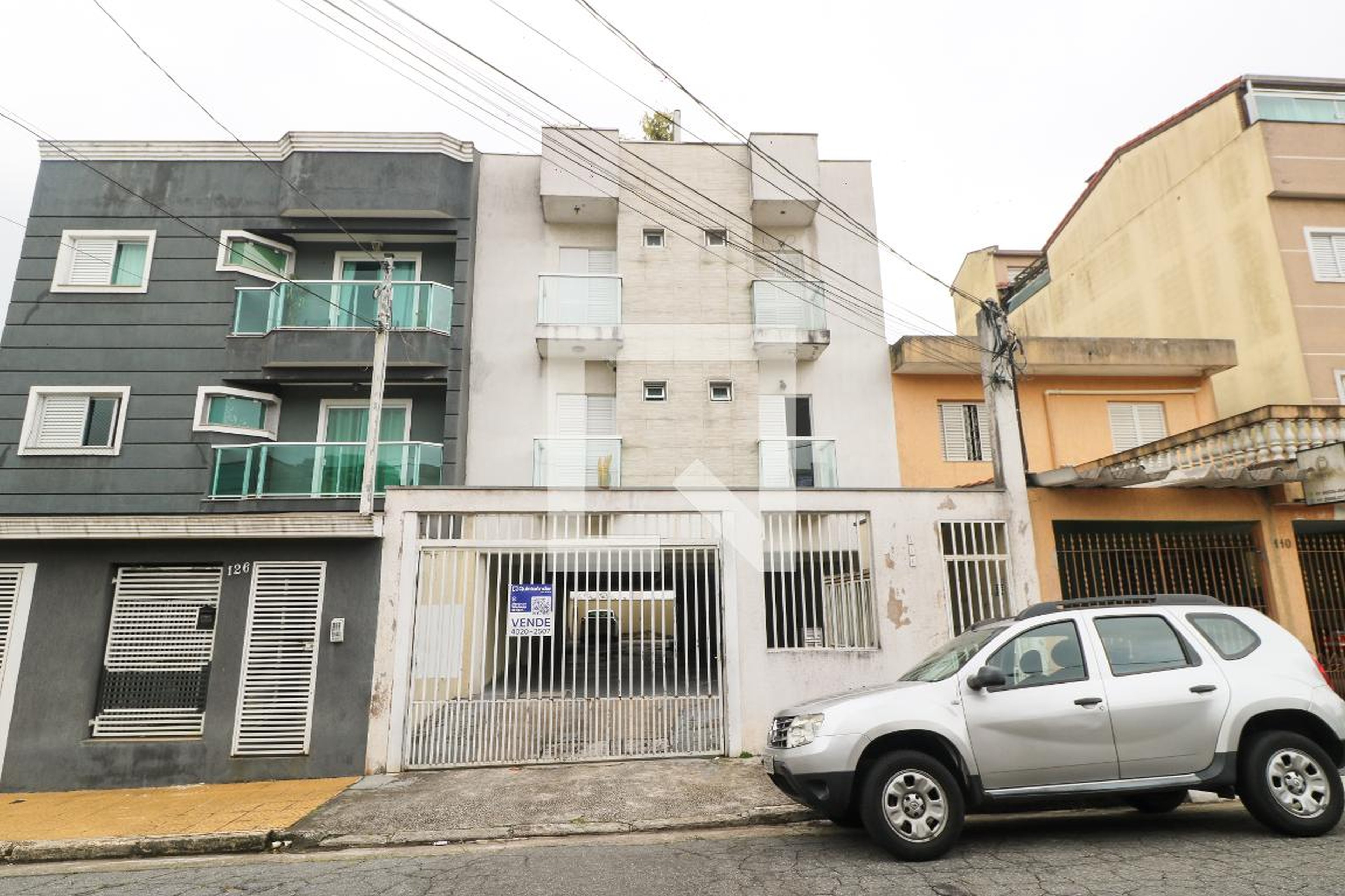 Fachada Condomínio em Rua Roque da Costa, 116
