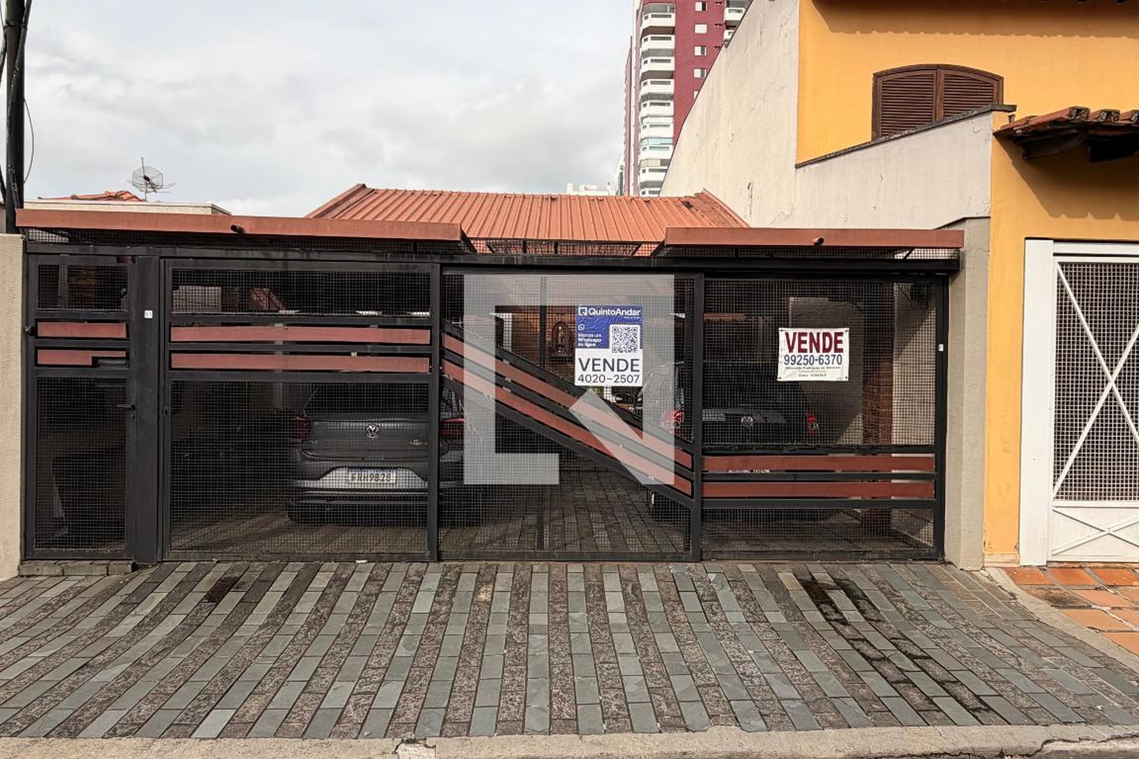 Fachada Condomínio em Rua Emílio Rossi, 61