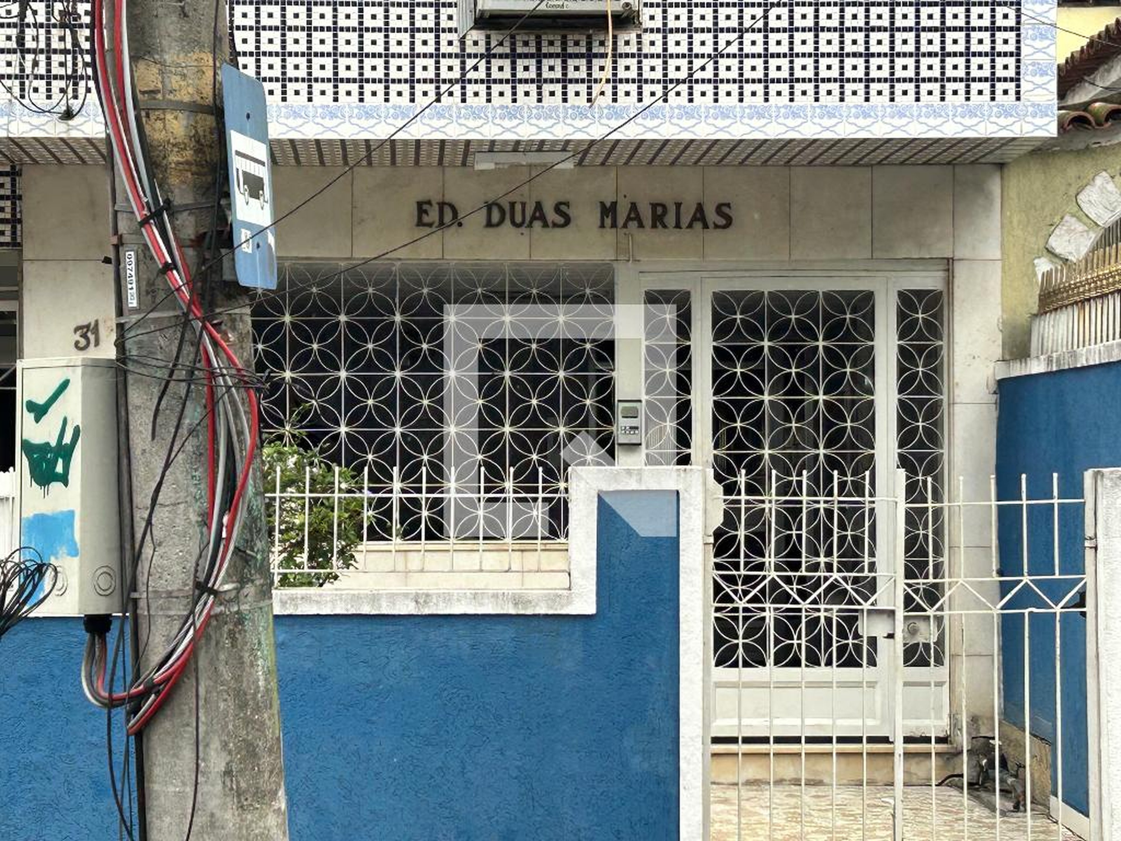 Fachada Condomínio em Rua das Camélias, 312