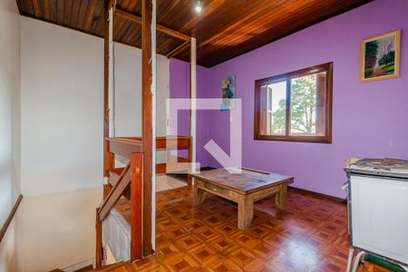 Sala do segundo andar de casa à venda com 3 quartos, 200m² em Campo Novo, Porto Alegre
