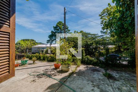 Vista de casa à venda com 3 quartos, 200m² em Campo Novo, Porto Alegre