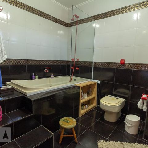 Casa à venda com 350m², 4 quartos e 3 vagasBanheiro do Quarto 2