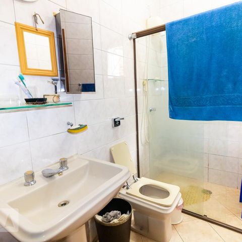 Casa à venda com 330m², 4 quartos e sem vagaBanheiro da Suíte 2