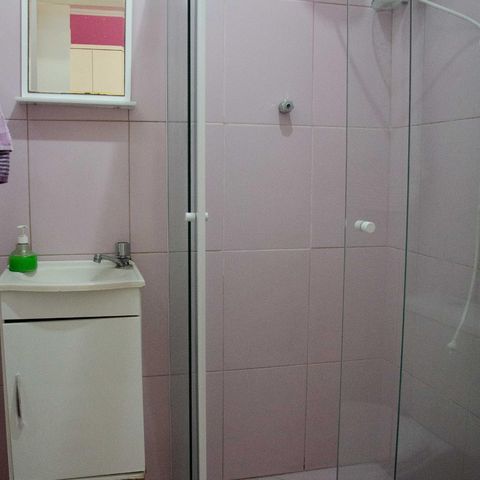 Casa à venda com 204m², 3 quartos e 6 vagasBanheiro da Suíte 1
