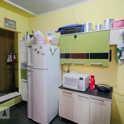 Casa à venda com 140m², 5 quartos e 5 vagasCasa 1 Cozinha