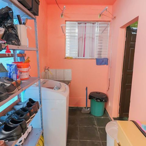 Casa à venda com 140m², 5 quartos e 5 vagasCasa 1 Lavanderia