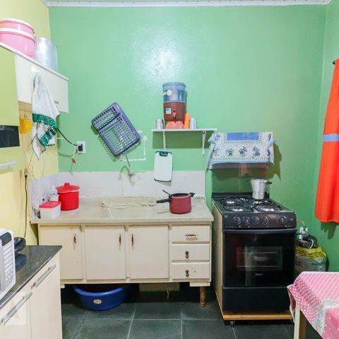 Casa à venda com 140m², 5 quartos e 5 vagasCasa 1 Cozinha
