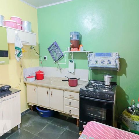 Casa à venda com 140m², 5 quartos e 5 vagasCasa 1 Cozinha