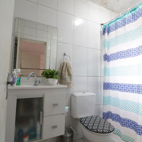 Casa à venda com 200m², 4 quartos e 3 vagasBanheiro suite 1