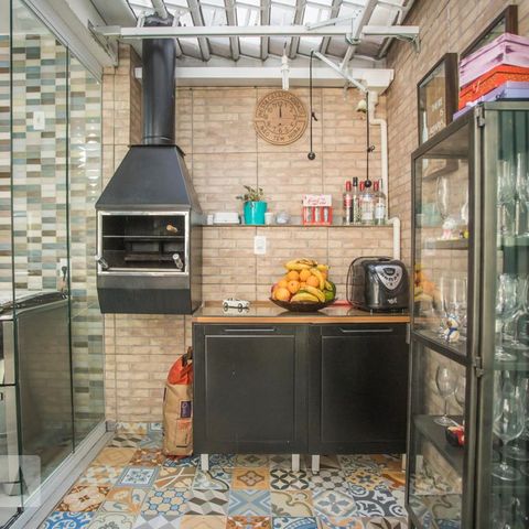 Casa de condomínio à venda com 130m², 3 quartos e 2 vagasChurrasqueira