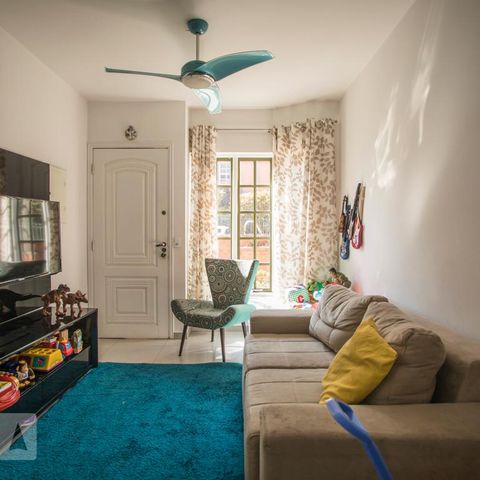 Casa de condomínio à venda com 130m², 3 quartos e 2 vagasSala de Estar