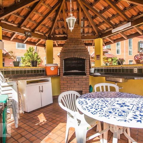 Casa de condomínio à venda com 130m², 3 quartos e 2 vagasÁrea comum - Churrasqueira