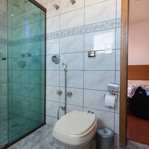 Casa à venda com 254m², 3 quartos e 2 vagasBanheiro do Quarto Suíte