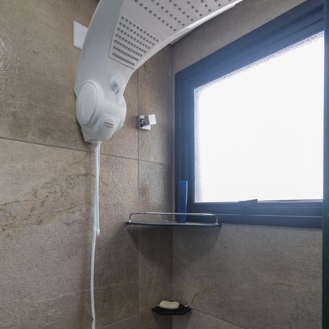 Apartamento à venda com 58m², 2 quartos e 1 vagaChuveiro